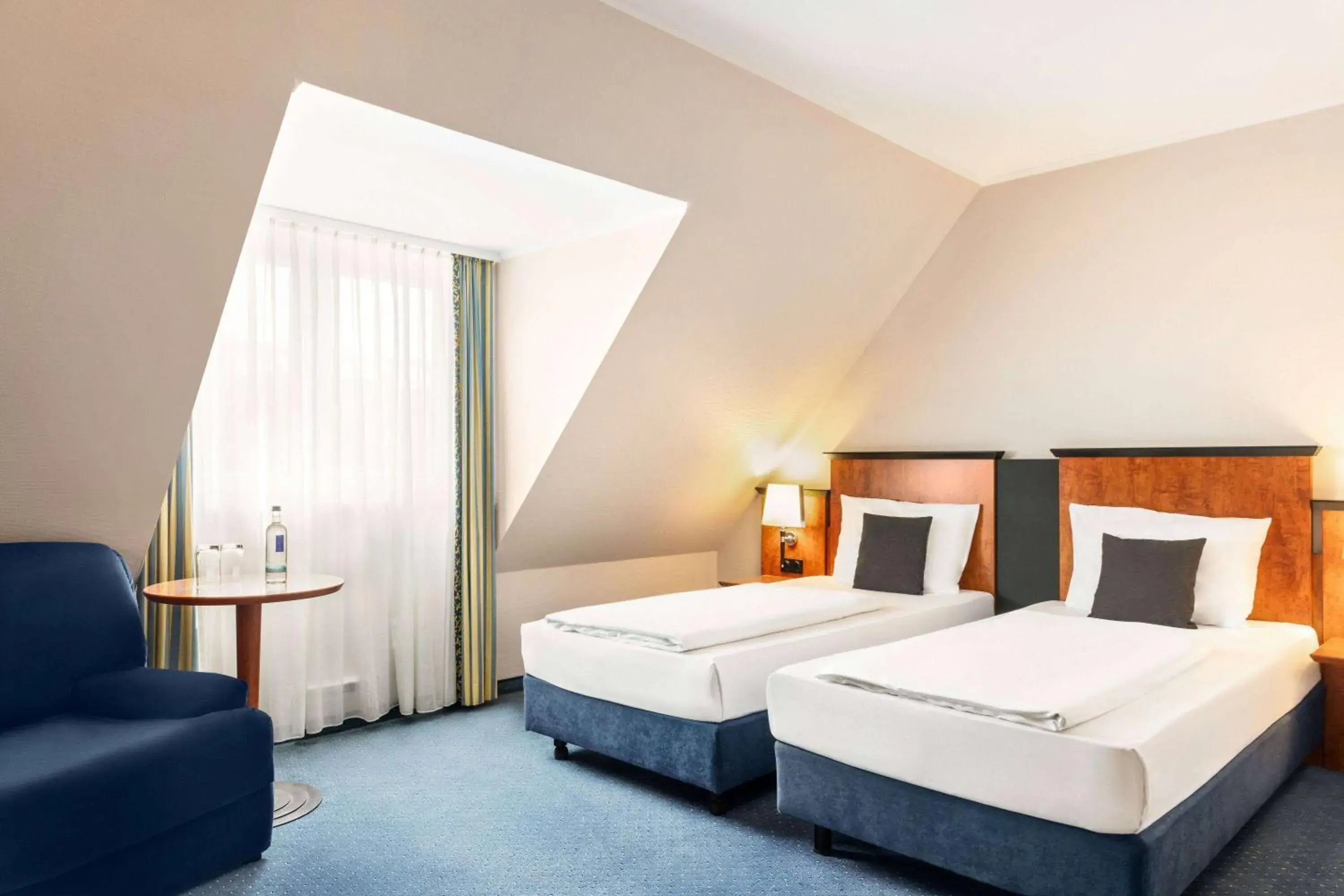 Photo of the whole room, Bed in Amedia Frankfurt Russelsheim Trademark Collection by Wyndham