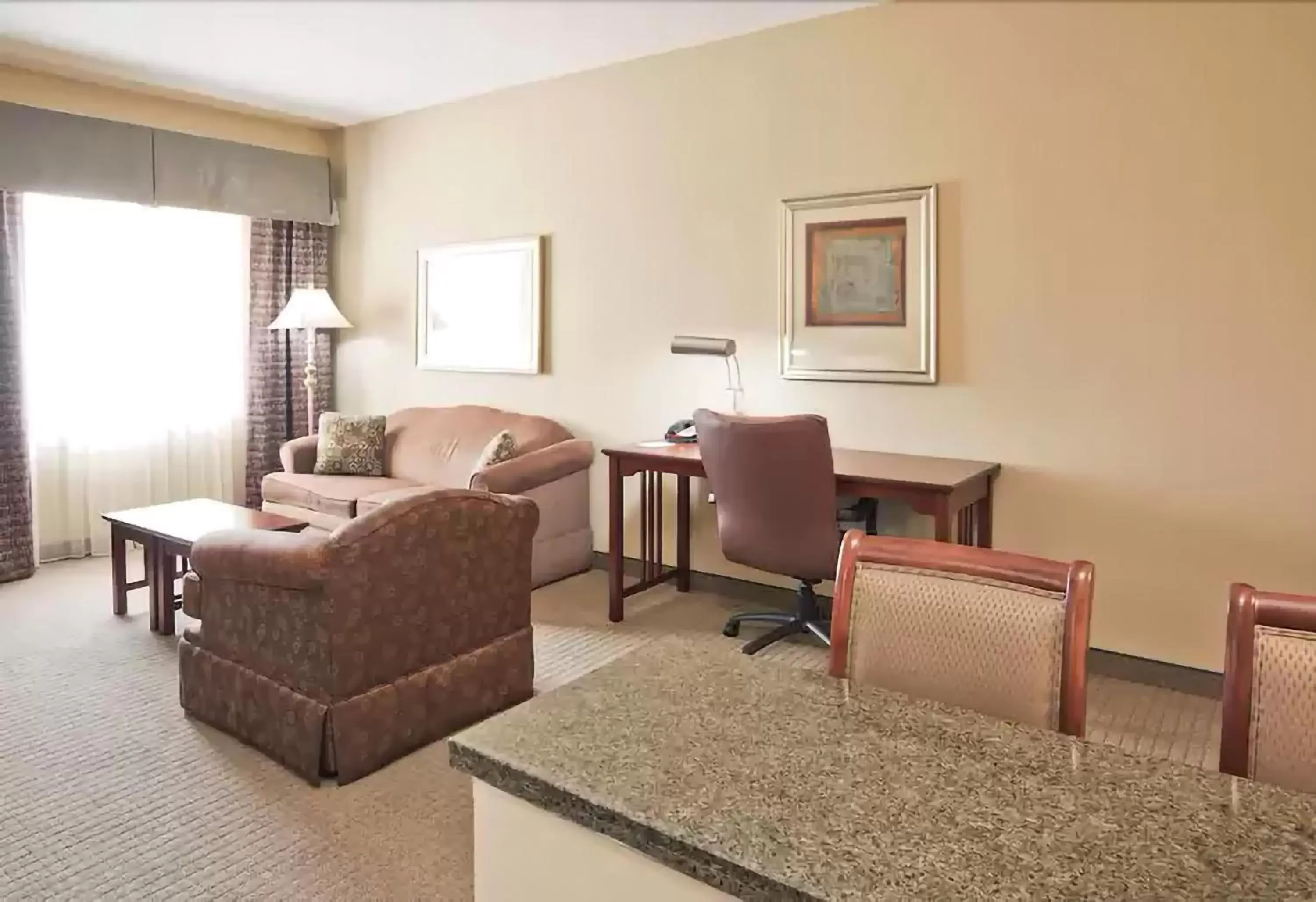 Living room, Seating Area in WeStay Suites - Covington/Mandeville