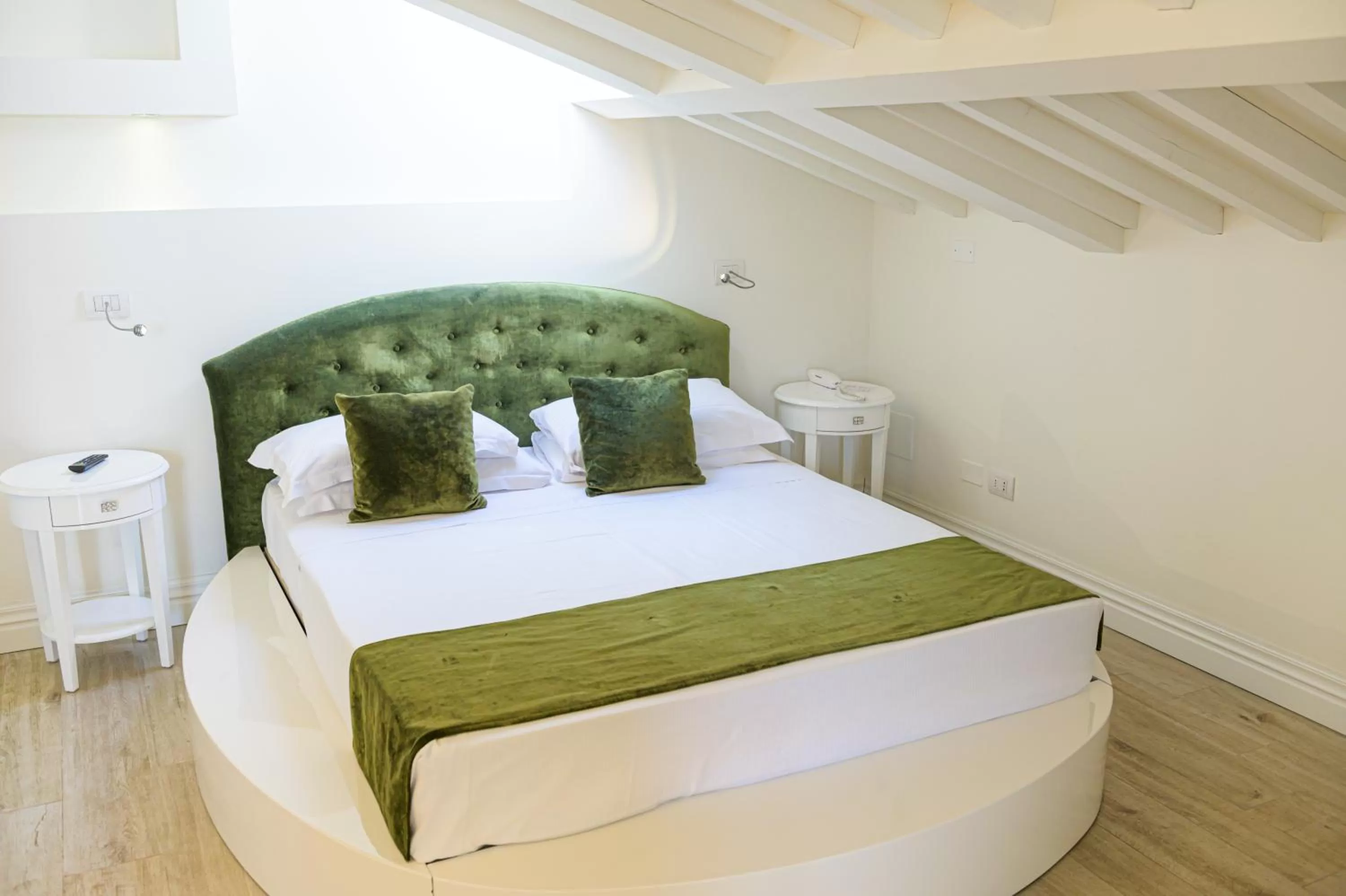 Bed in VILLA LIBERTY Boutique Hotel - Borgo Capitano Collection