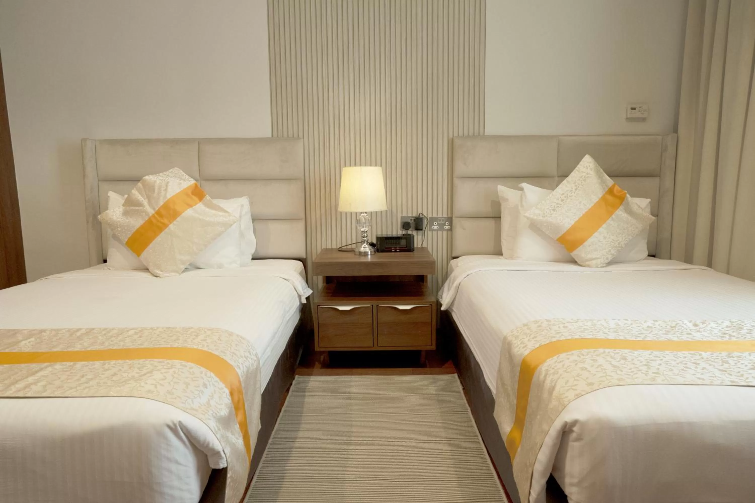 Bed in City Tower Hotel