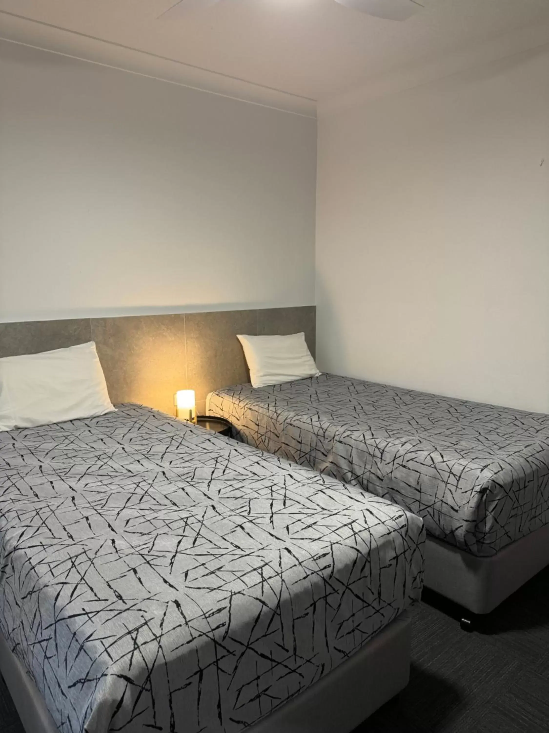 Bed in Longreach Motor Inn