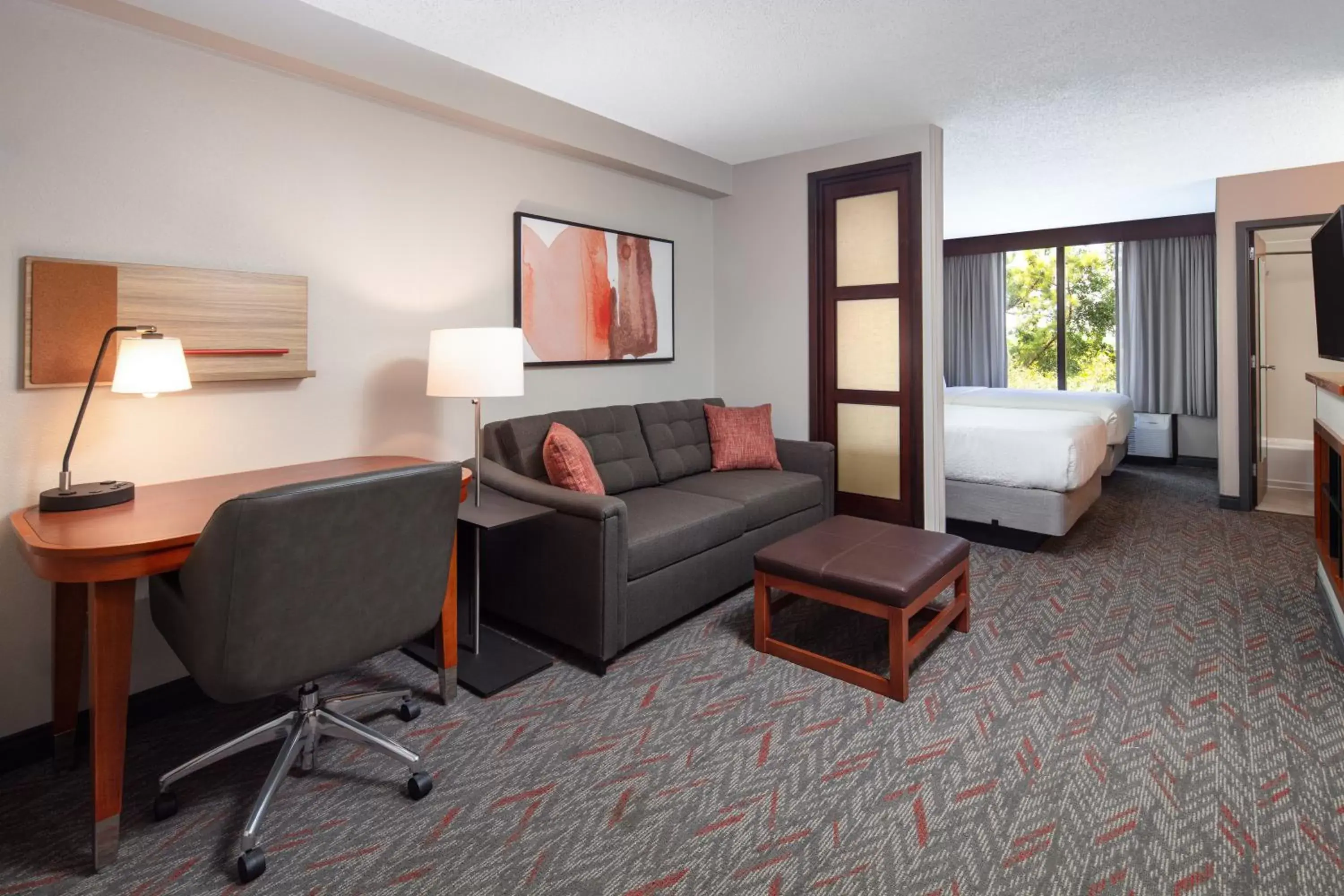 Bed, Seating Area in Candlewood Suites - Birmingham - Inverness, an IHG Hotel