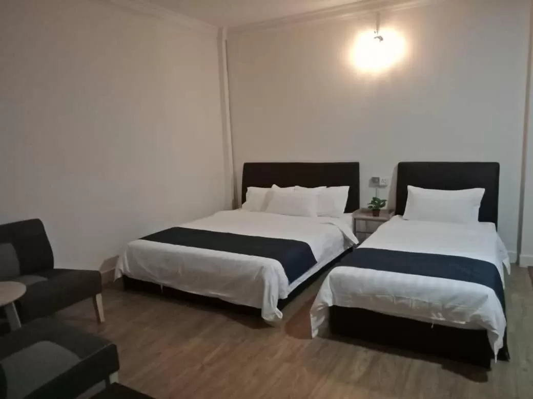 Bed in Star Seasons Hotel