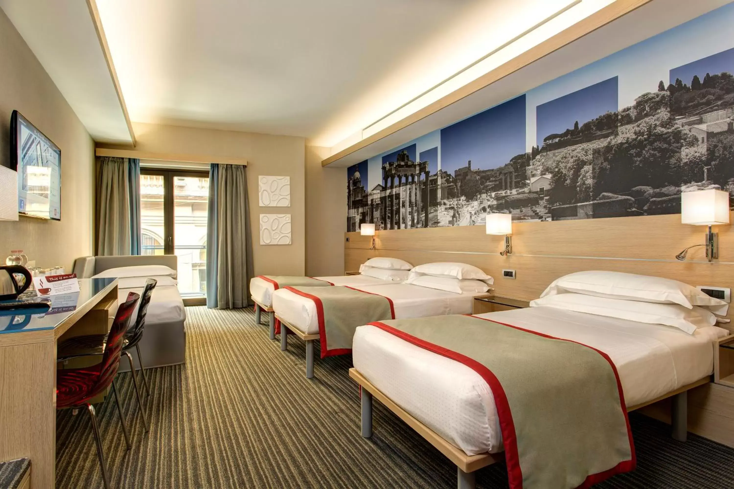 Bedroom in iQ Hotel Roma