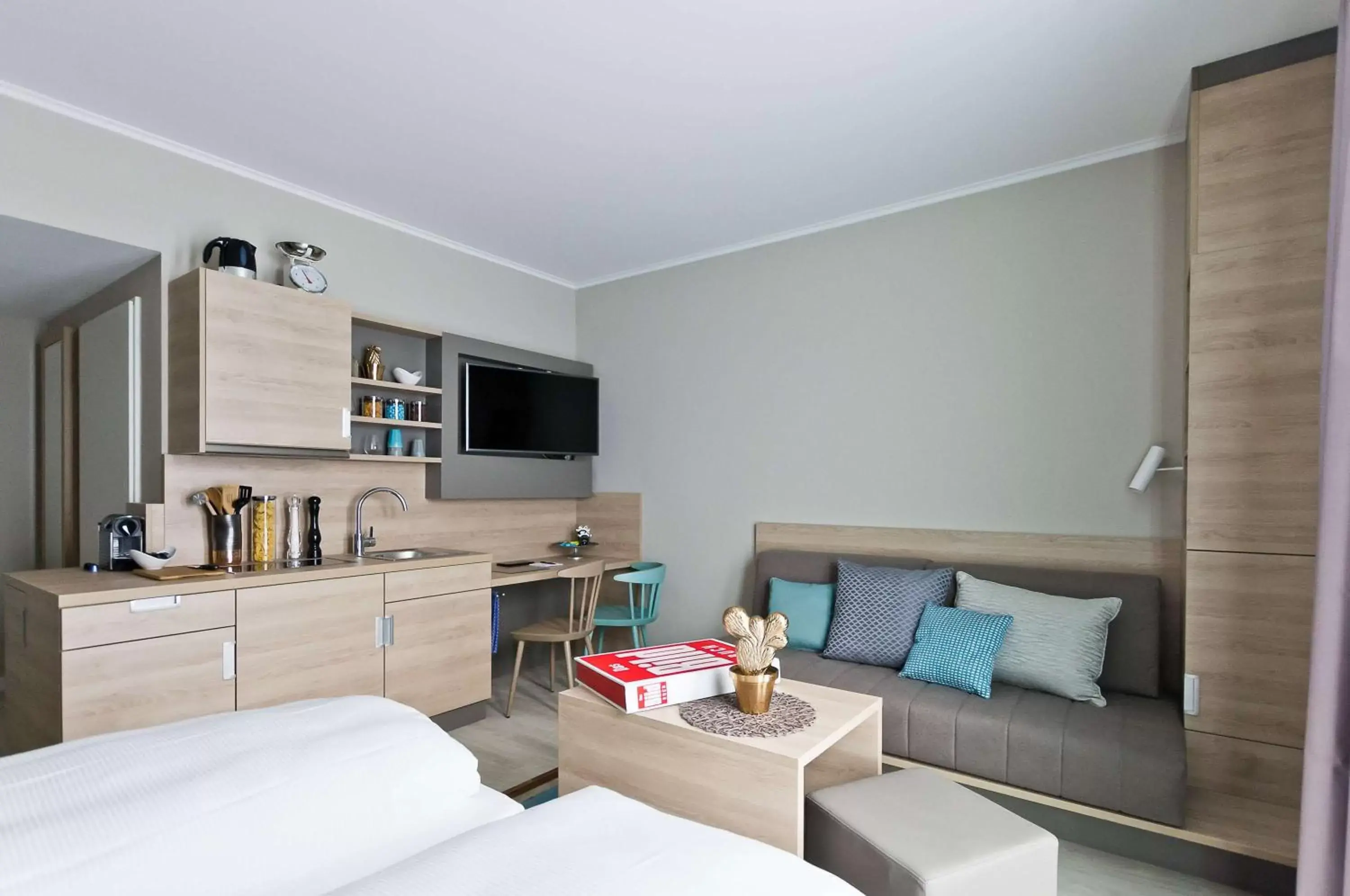 Bedroom, Seating Area in ANA Living Stuttgart by Arthotel ANA