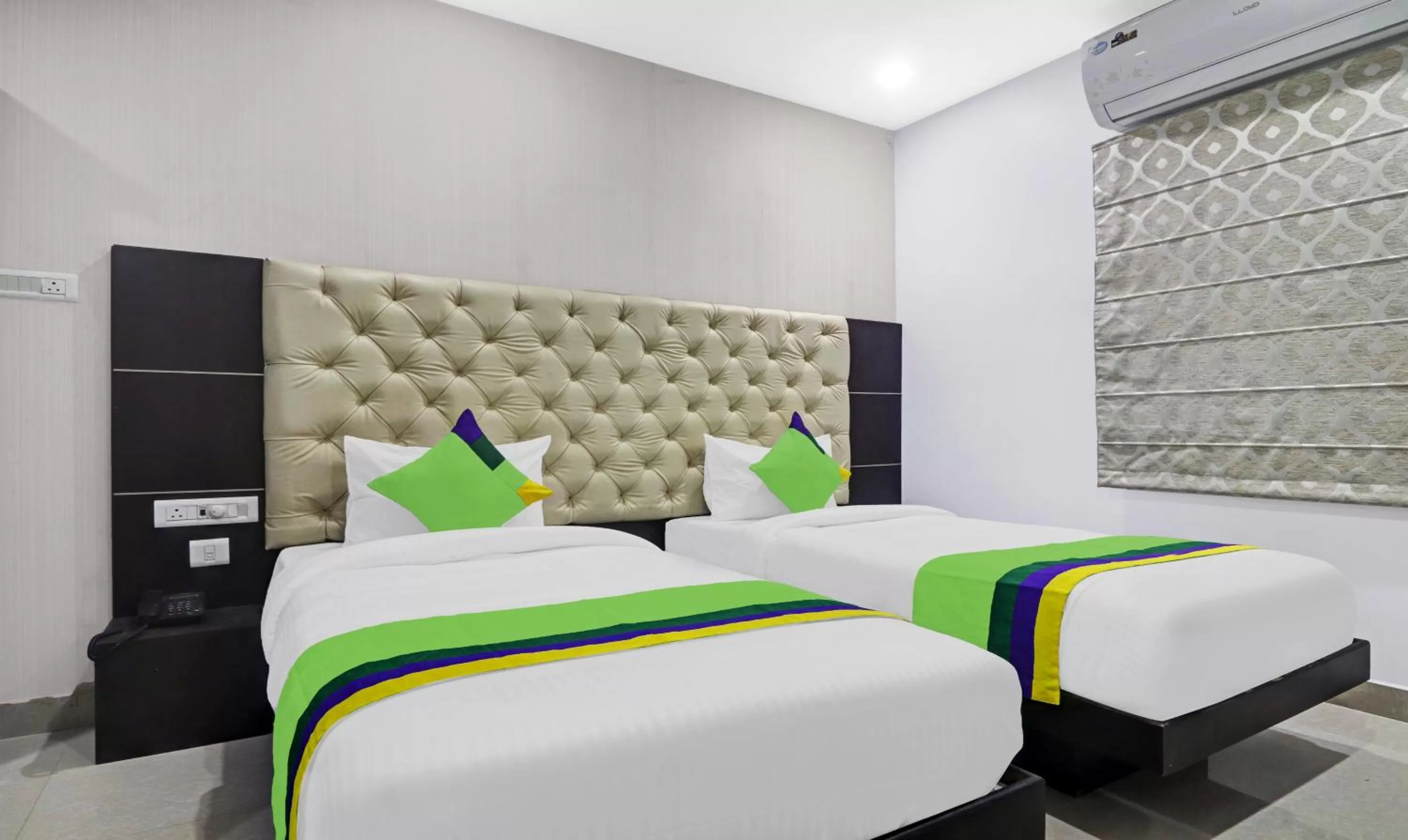 Bed in Treebo Kruthika Residency