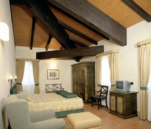 Bed in Hotel La Cantina