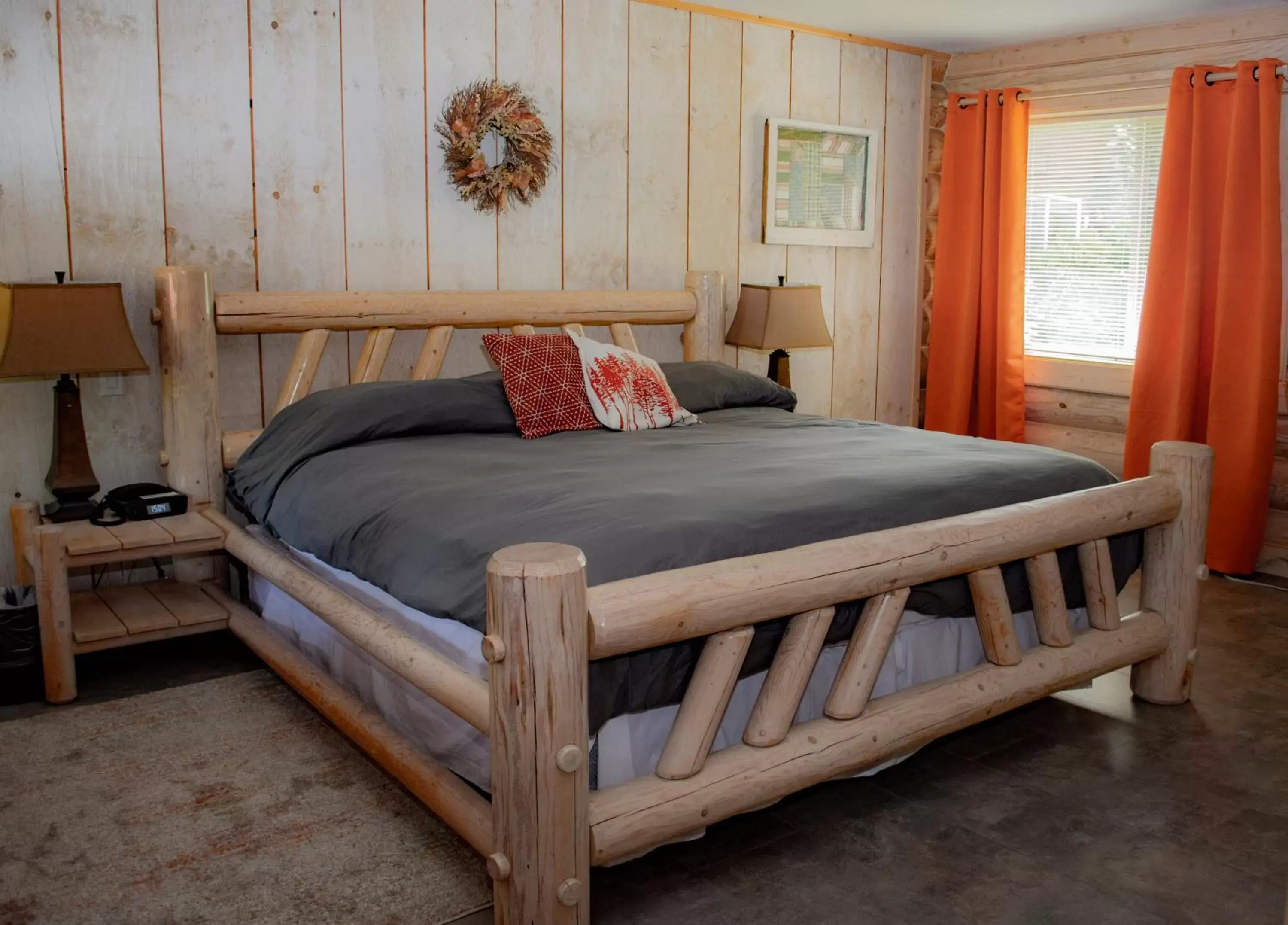 Bed in Log Inn Bonners Ferry