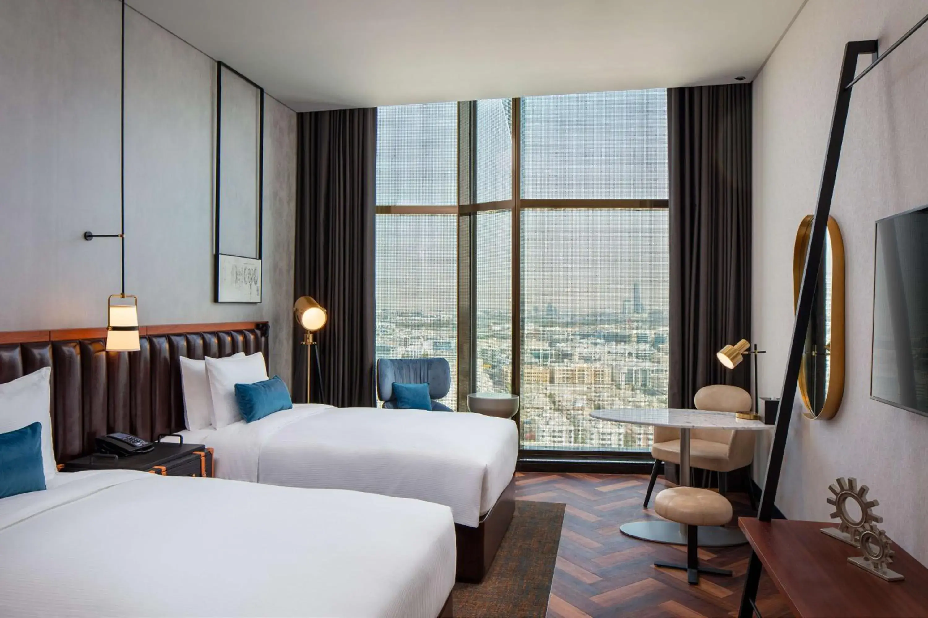 Bedroom in DoubleTree by Hilton Dubai M Square Hotel & Residences