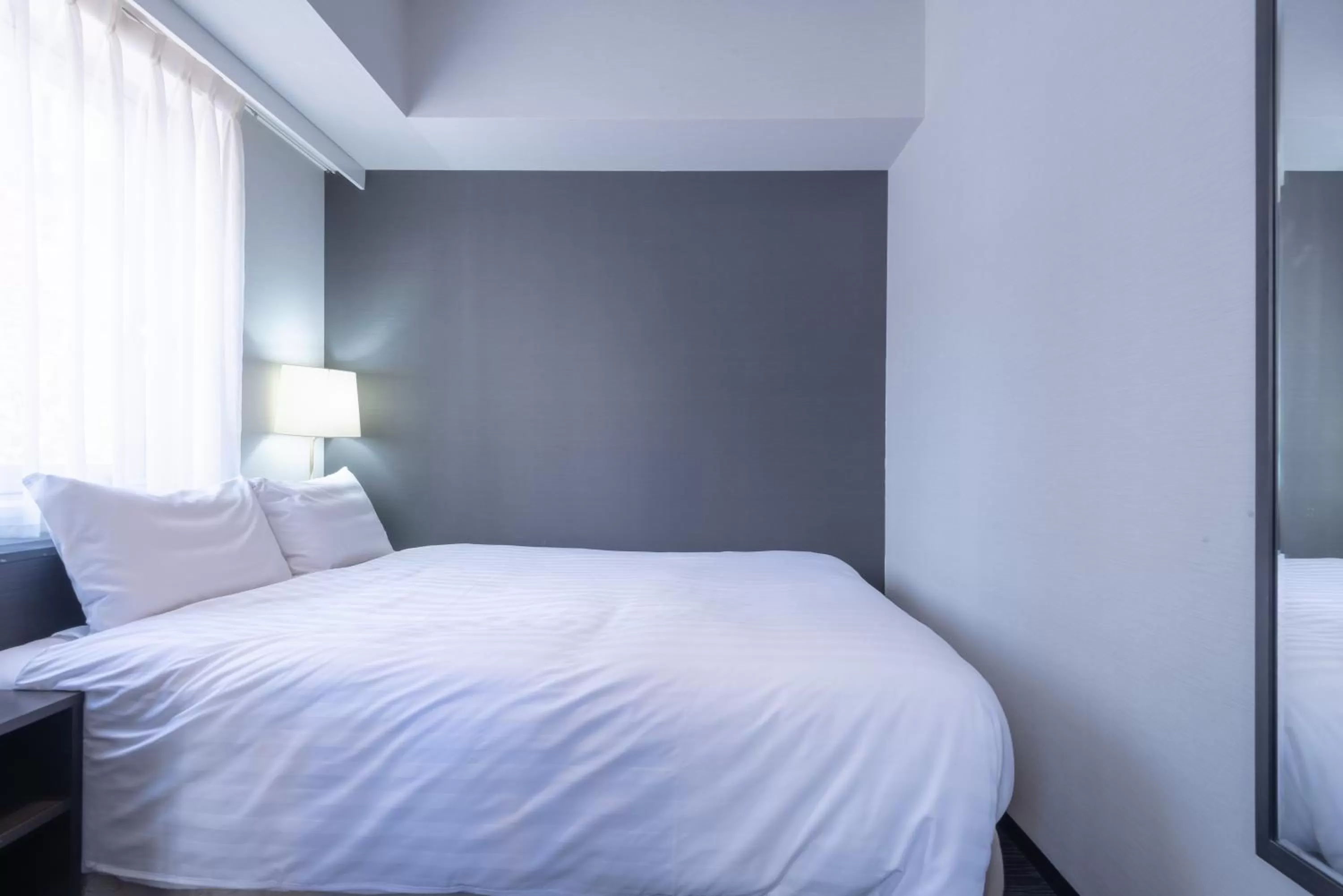 Bed in E Hotel Higashi Shinjuku