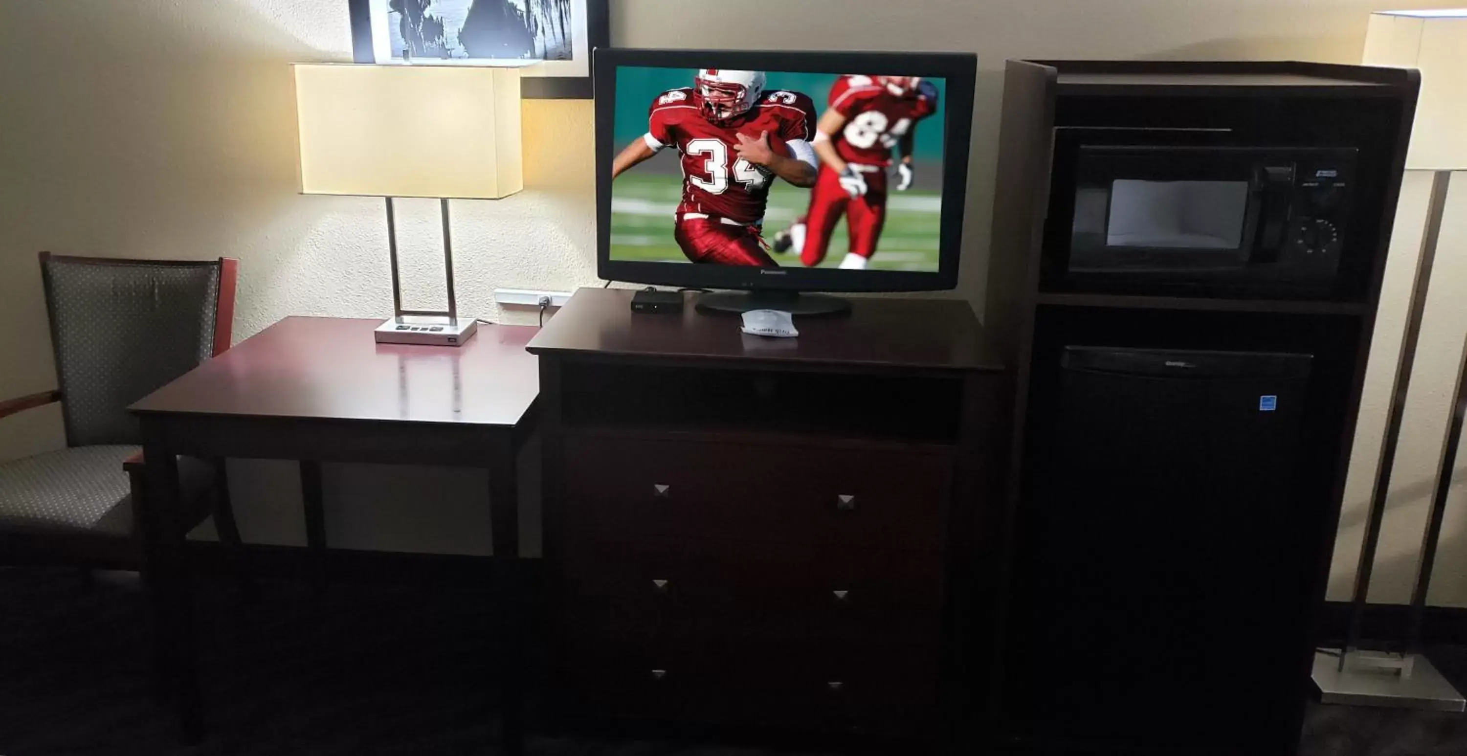 Photo of the whole room, TV/Entertainment Center in Red Roof Inn Port Allen