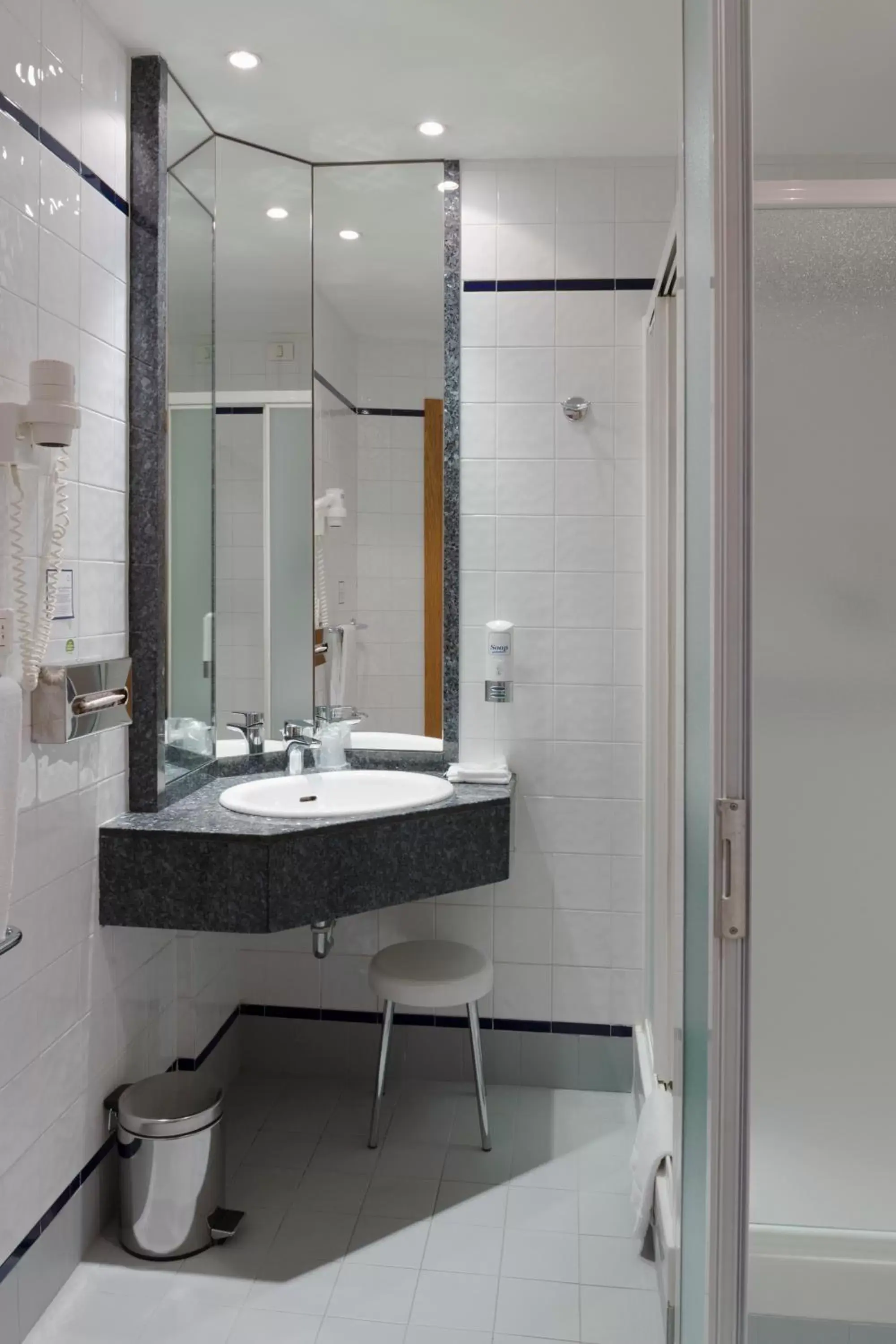 Bathroom in City Hotel & Suites