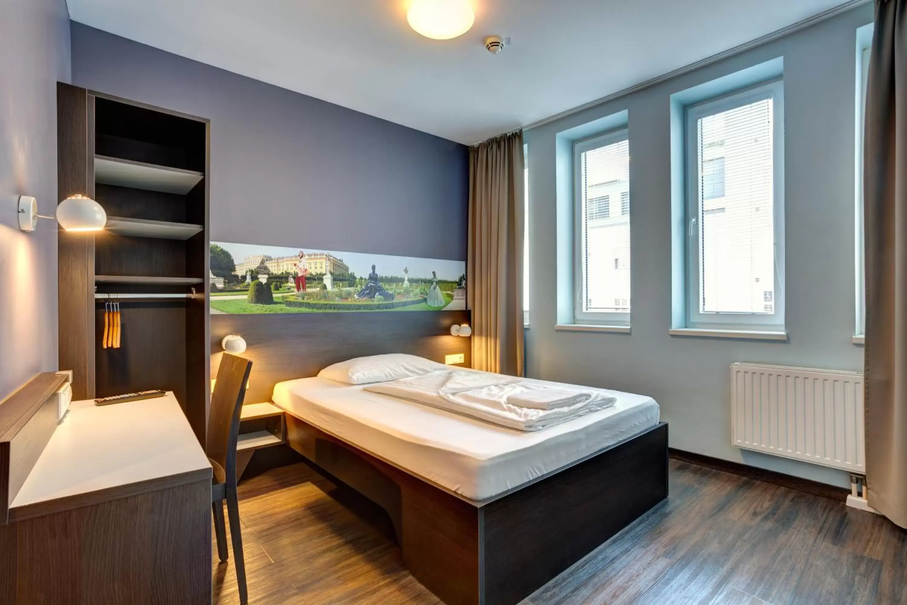 Photo of the whole room, Bed in MEININGER Hotel Wien Downtown Sissi