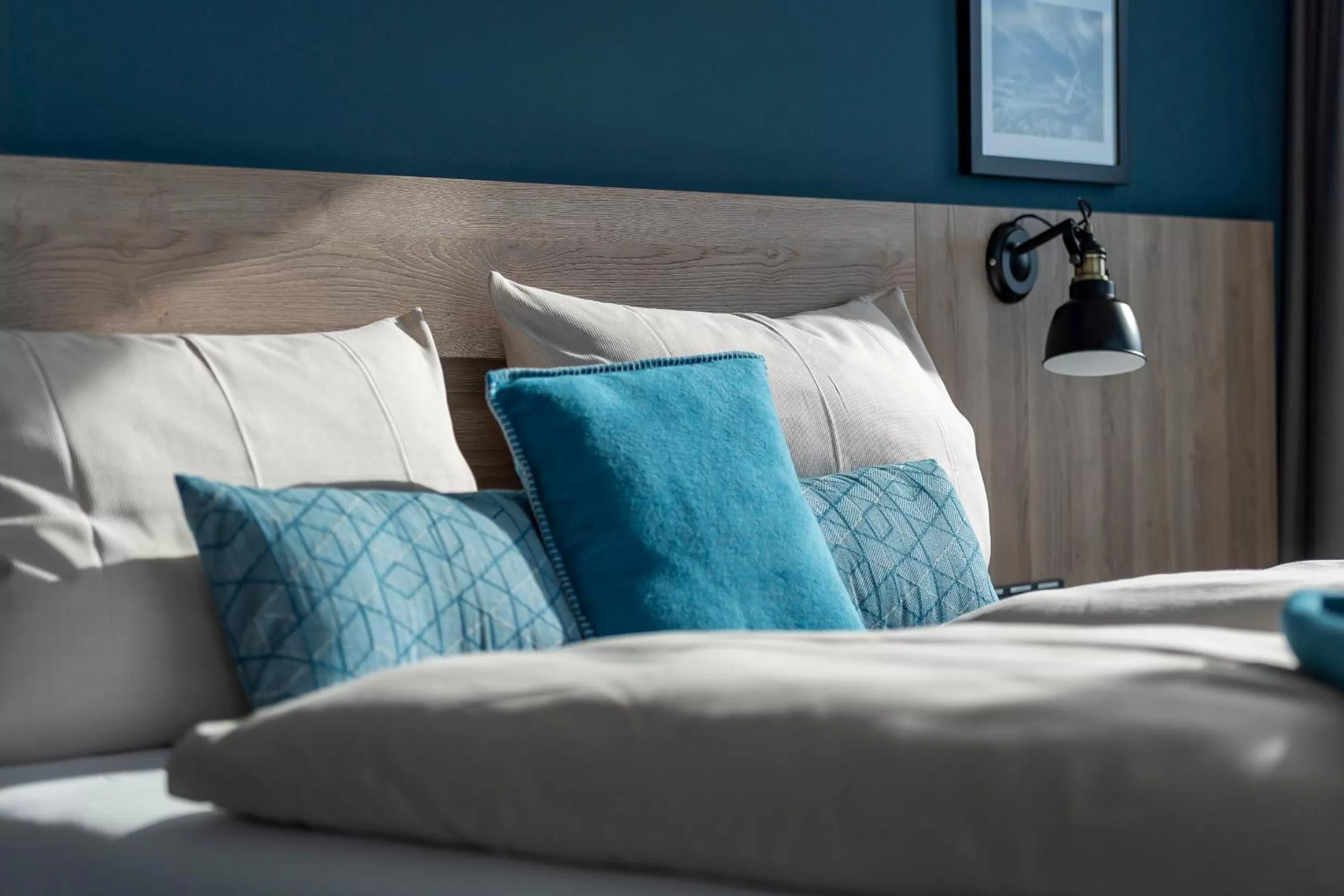 Bed in HARBR Hotel Konstanz, a member of Radisson Individuals