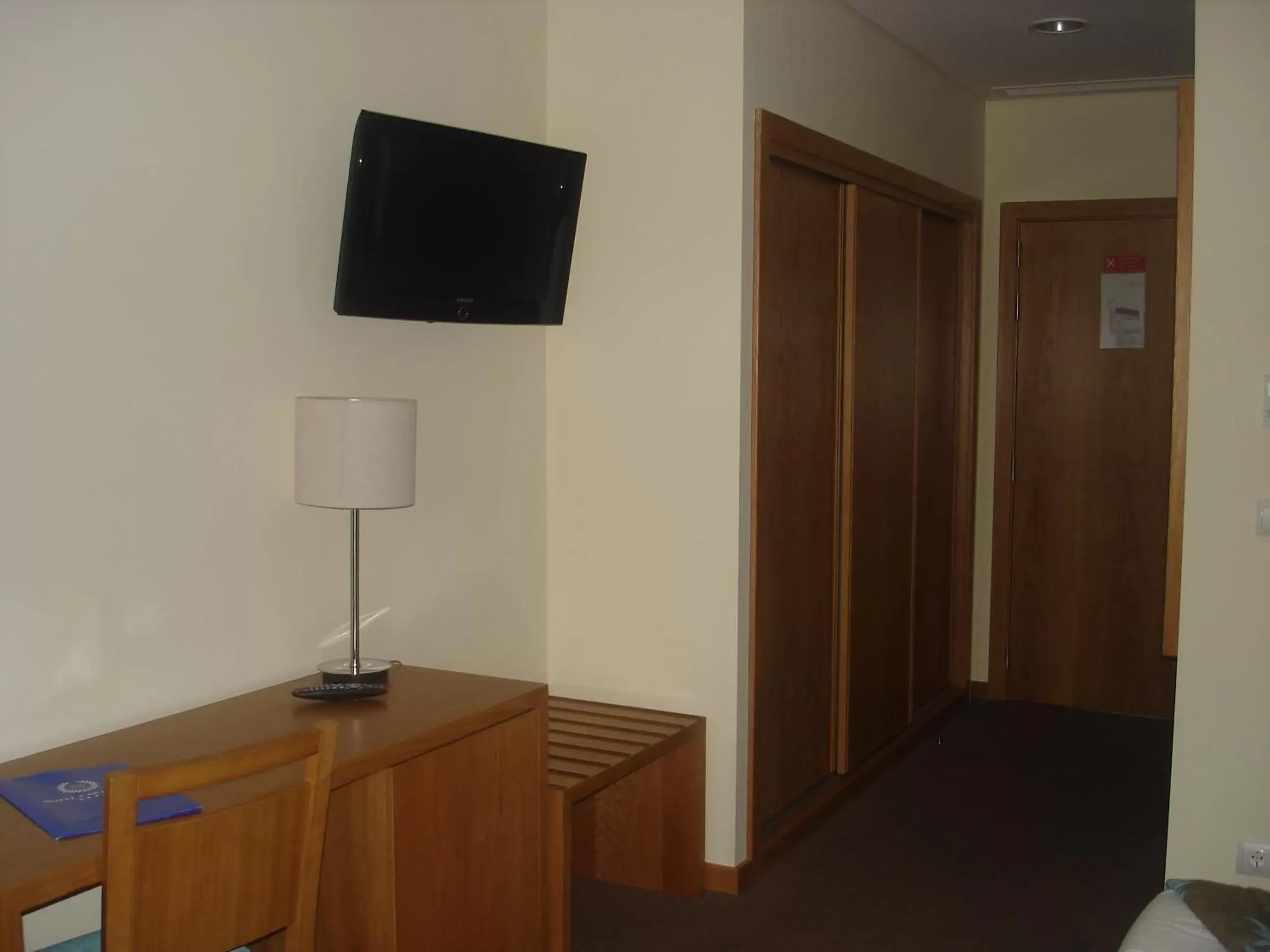 Photo of the whole room, TV/Entertainment Center in Hotel Caravelas