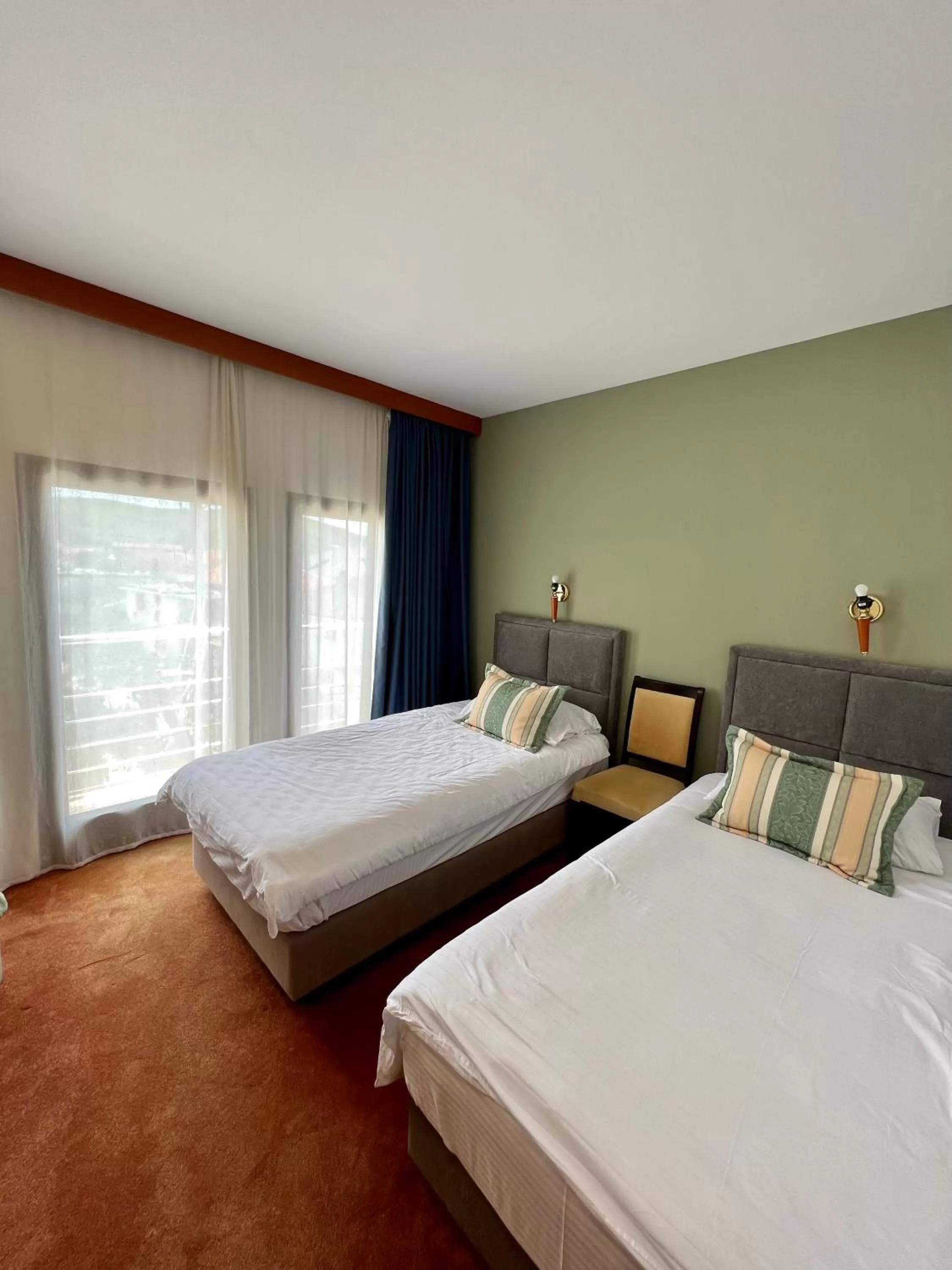 Bed in Hotel Millennium