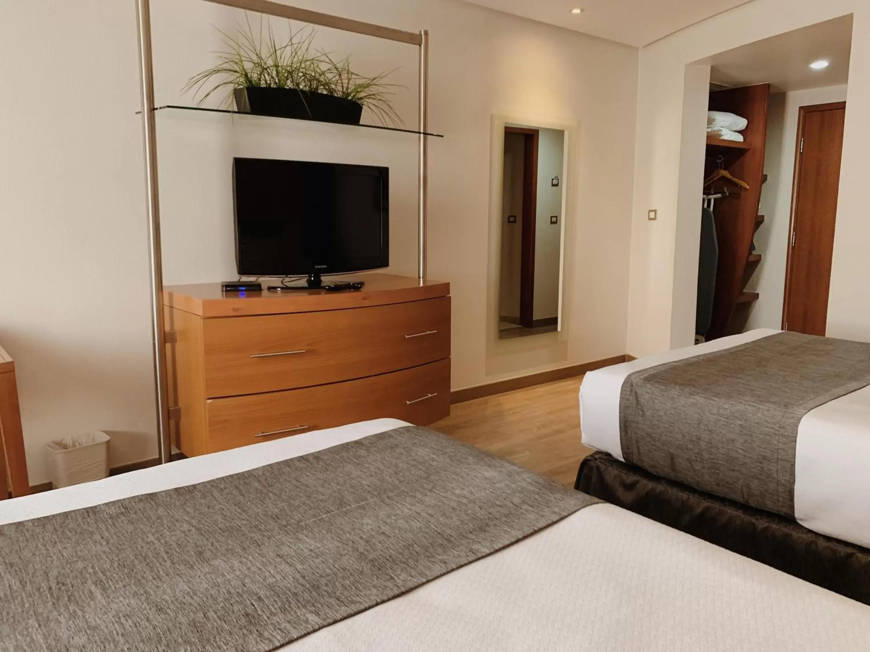 Bed in Hotel Mercury Inn