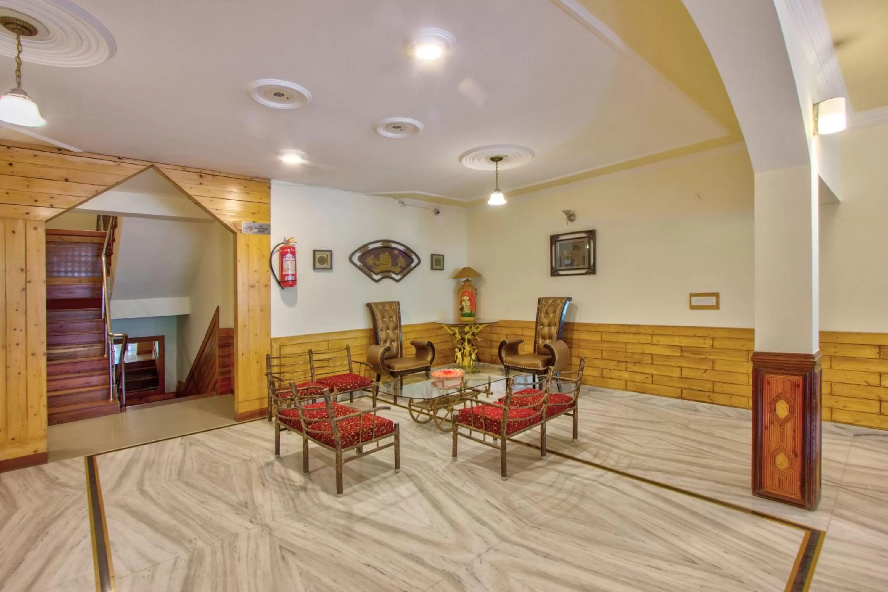 Seating area in Woodstock Inn Manali 800 Mtrs from Mall Road