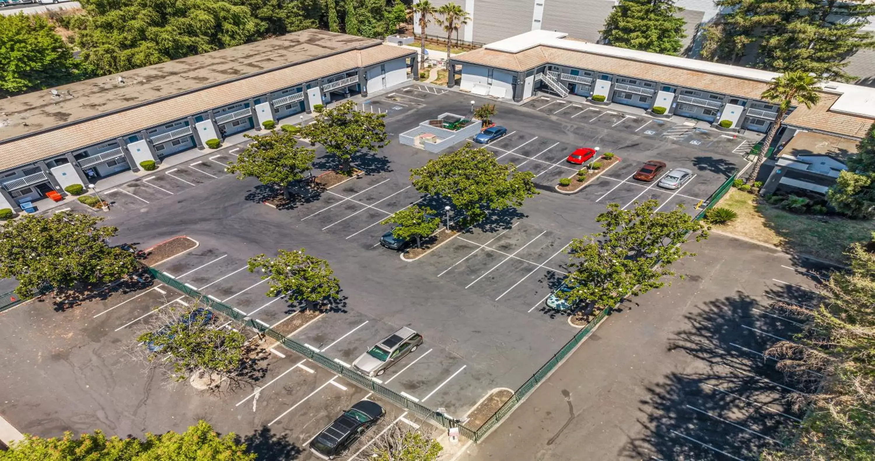 Parking, Bird's-eye View in SureStay Plus Hotel by Best Western Sacramento North