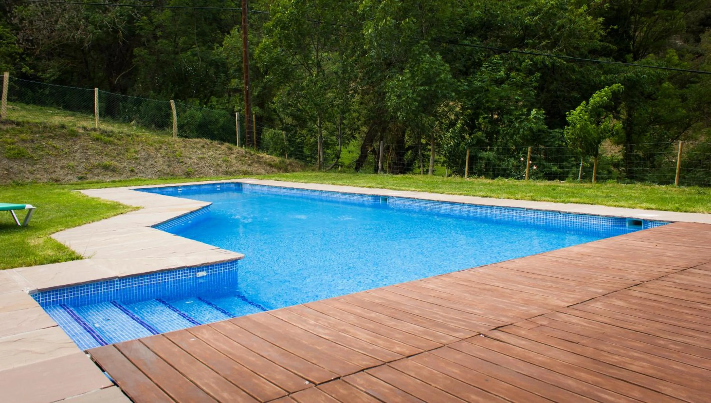 Swimming pool in Viviendas Rurales El Covaju