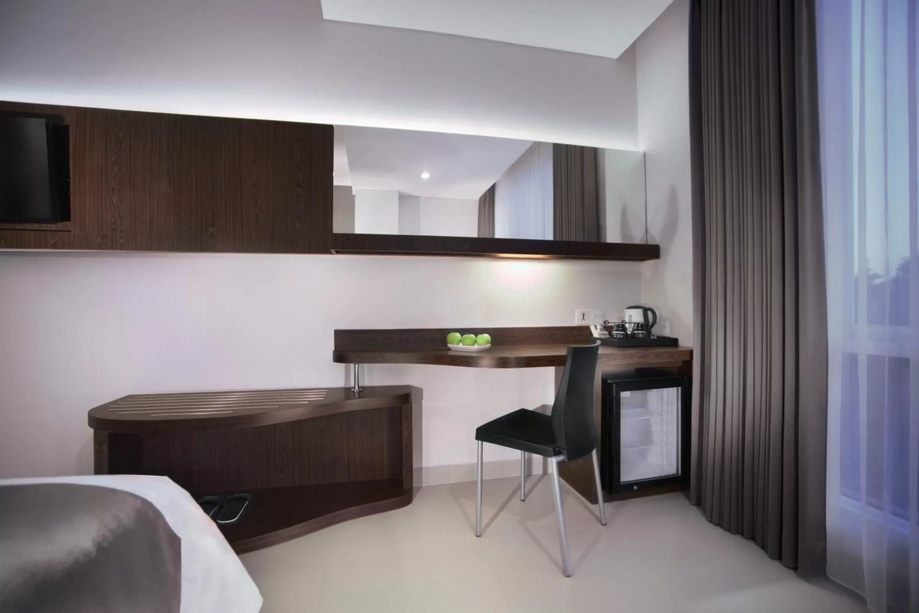 Coffee/tea facilities, TV/Entertainment Center in Neo Denpasar by ASTON