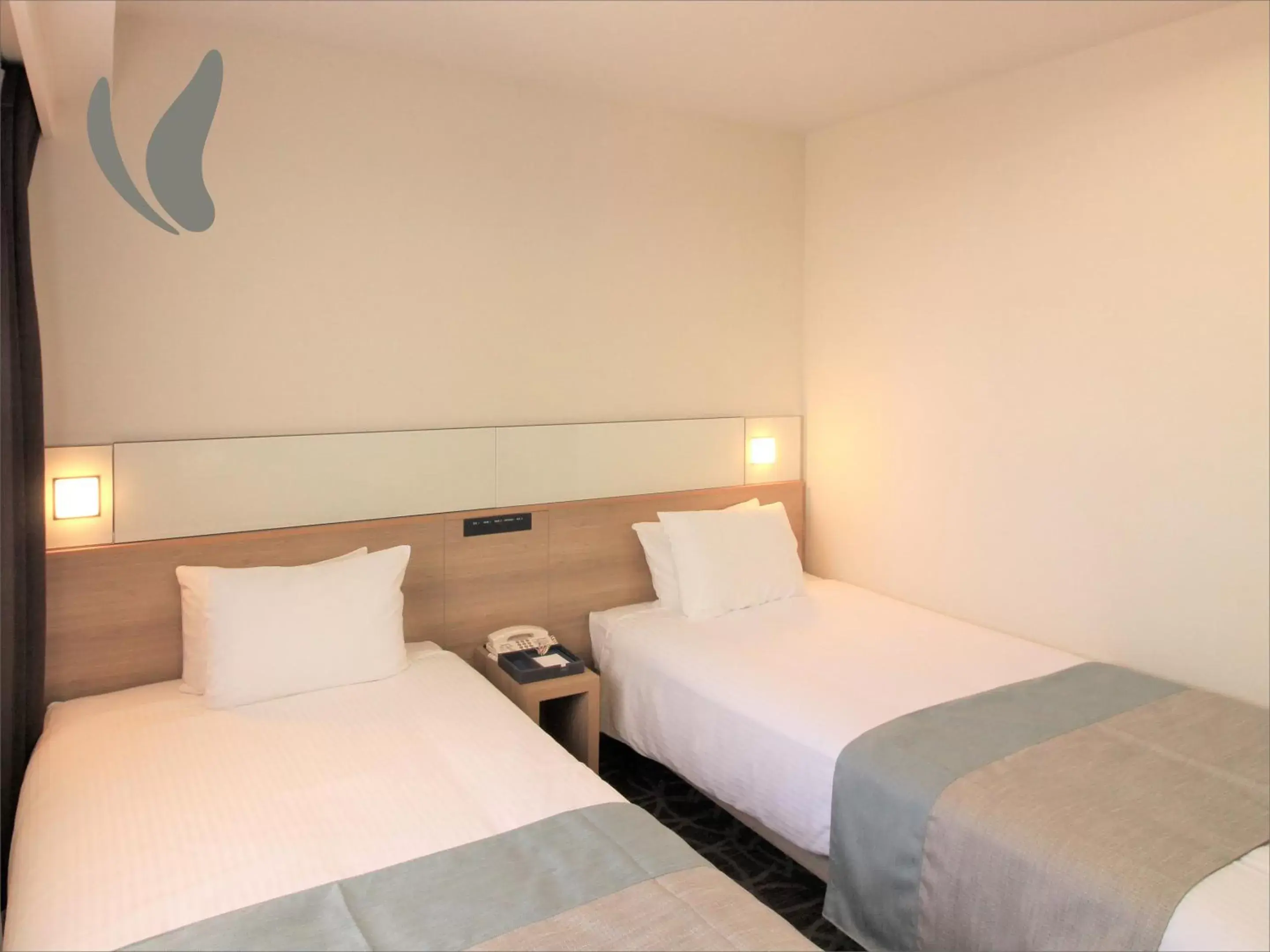 Bed in Hotel Hokke Club Naha Shintoshin Bed in Hotel Hokke Club Naha Shintoshin