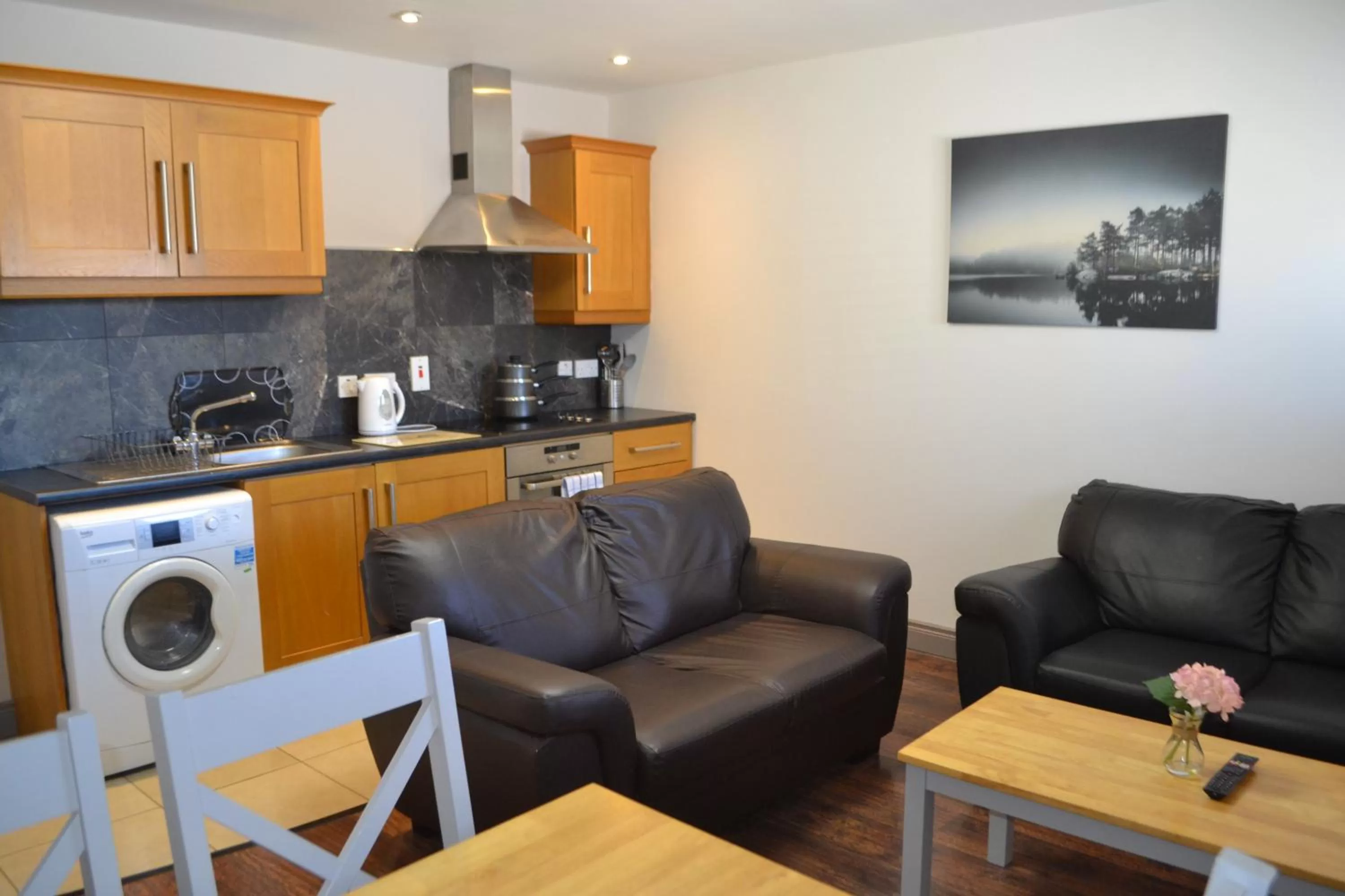 Kitchen or kitchenette in Walsh's Hotel and Apartments