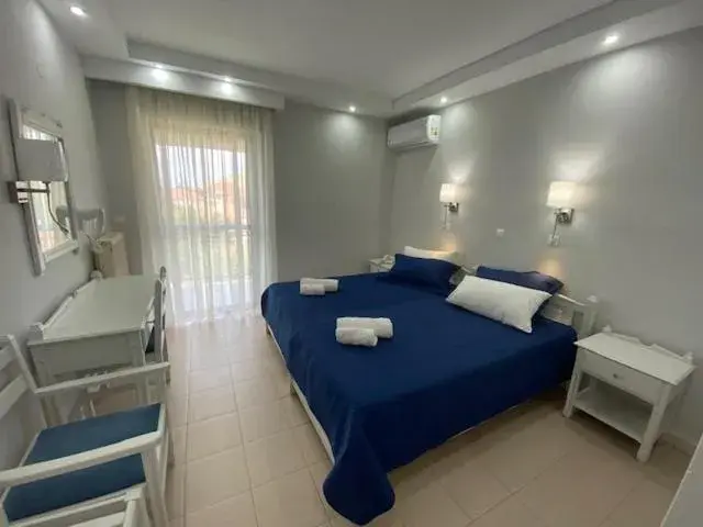 Bed in Ifestos Hotel