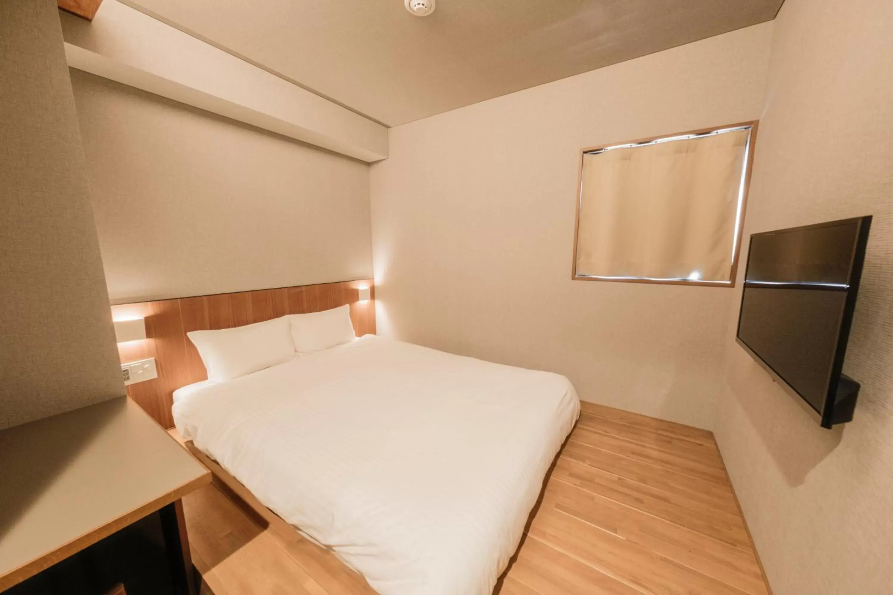 Bed in &HOTEL HAKATA