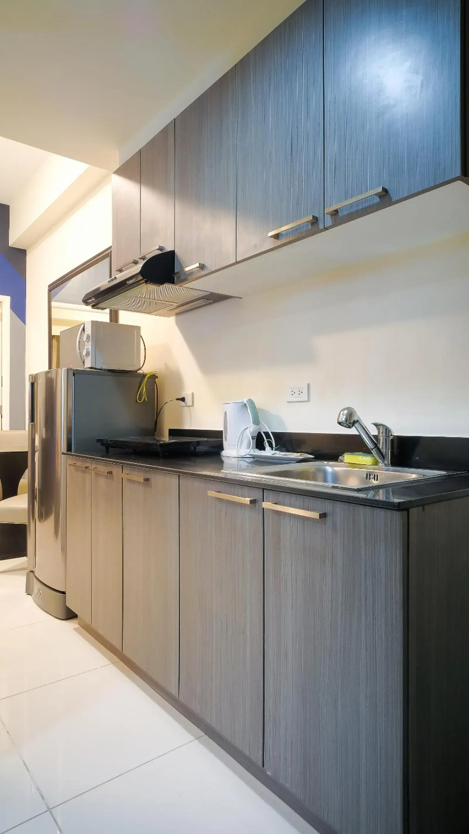 Kitchen/Kitchenette in Currency Serviced Suites