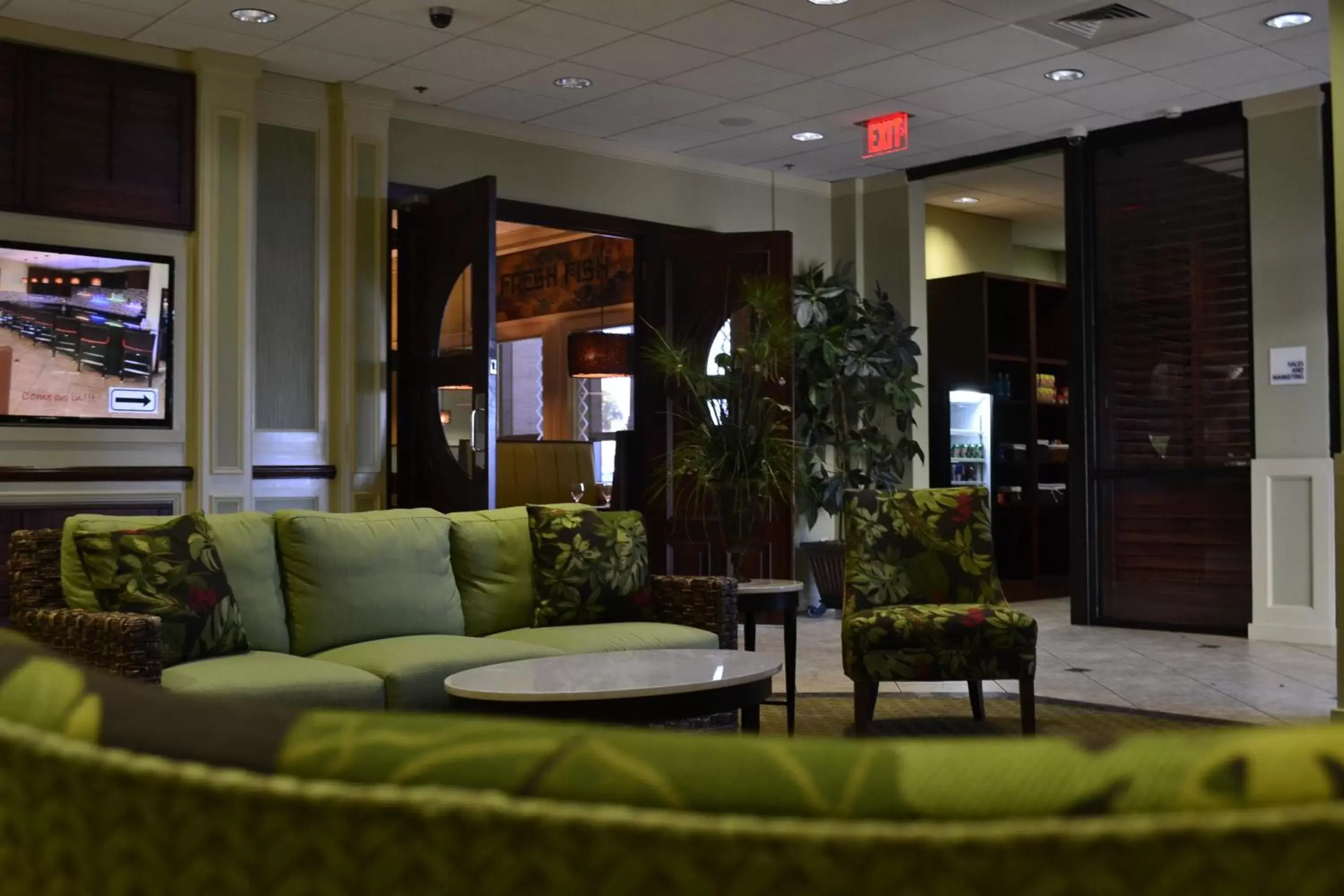 Communal lounge/ TV room, Lobby/Reception in Wyndham Garden Fort Walton Beach Destin