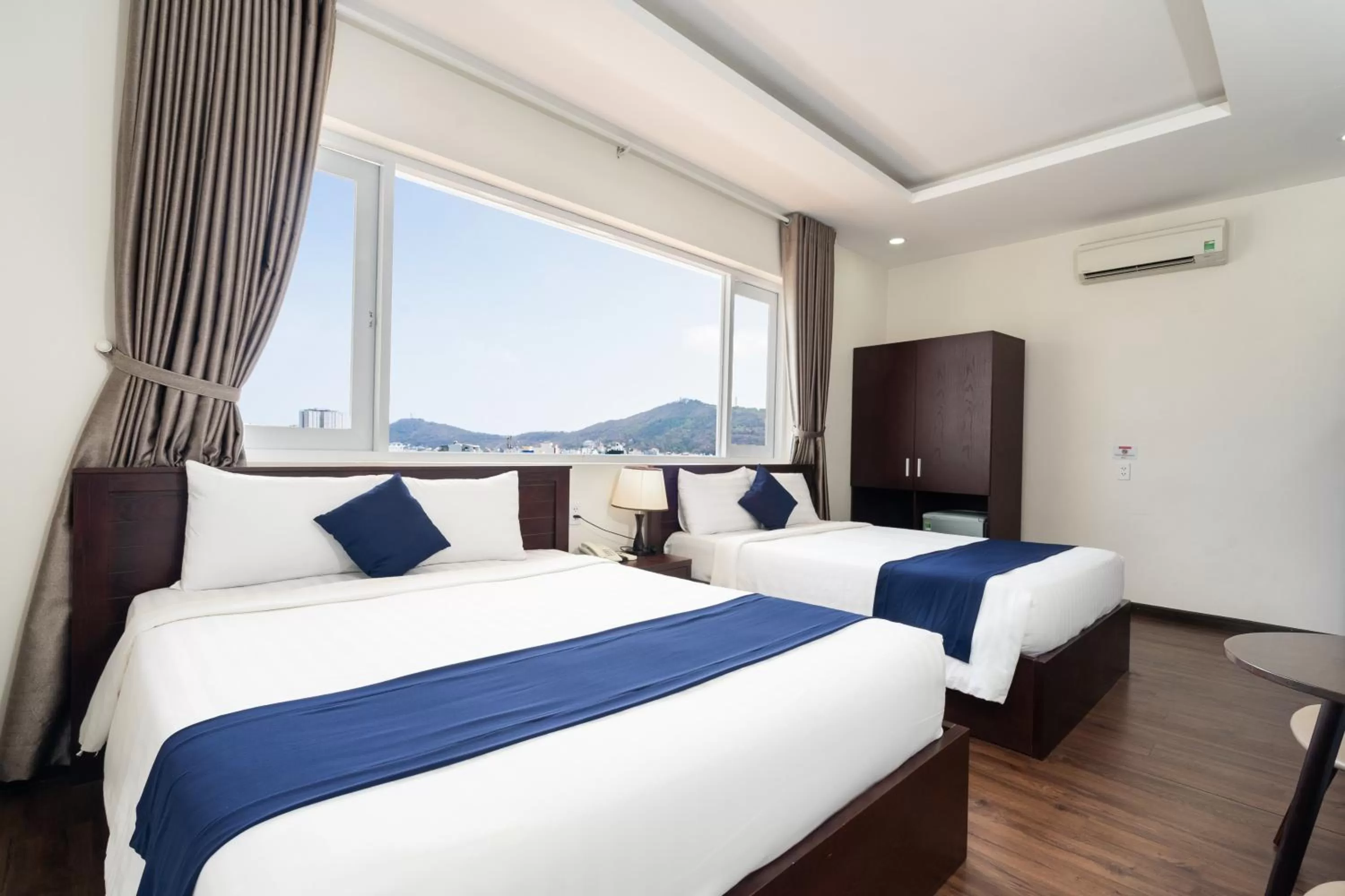 Bed in Central Hotel by Joi Hospitality