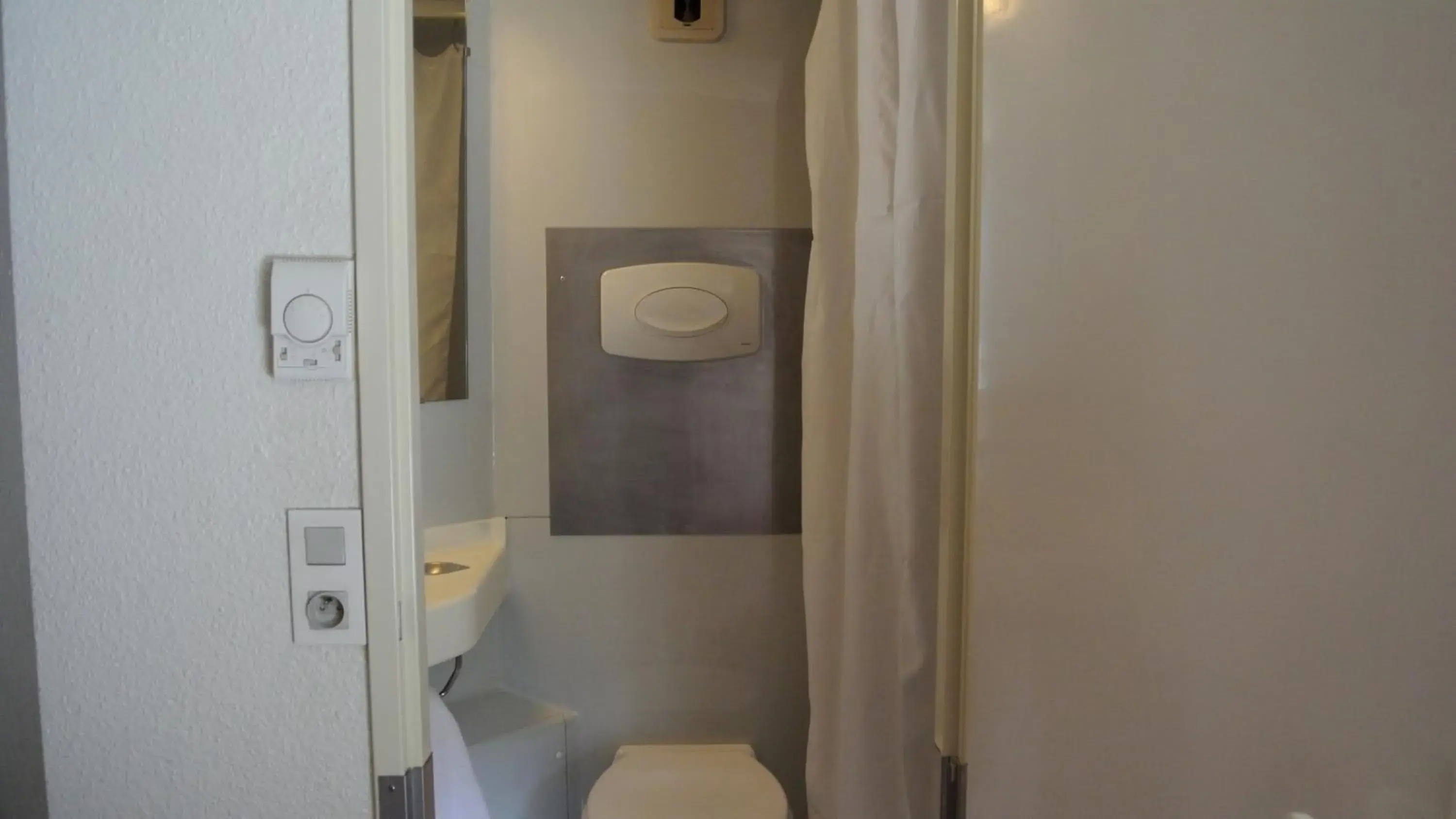 Bathroom in Premiere Classe Lyon Sud - Chasse Sur Rhône