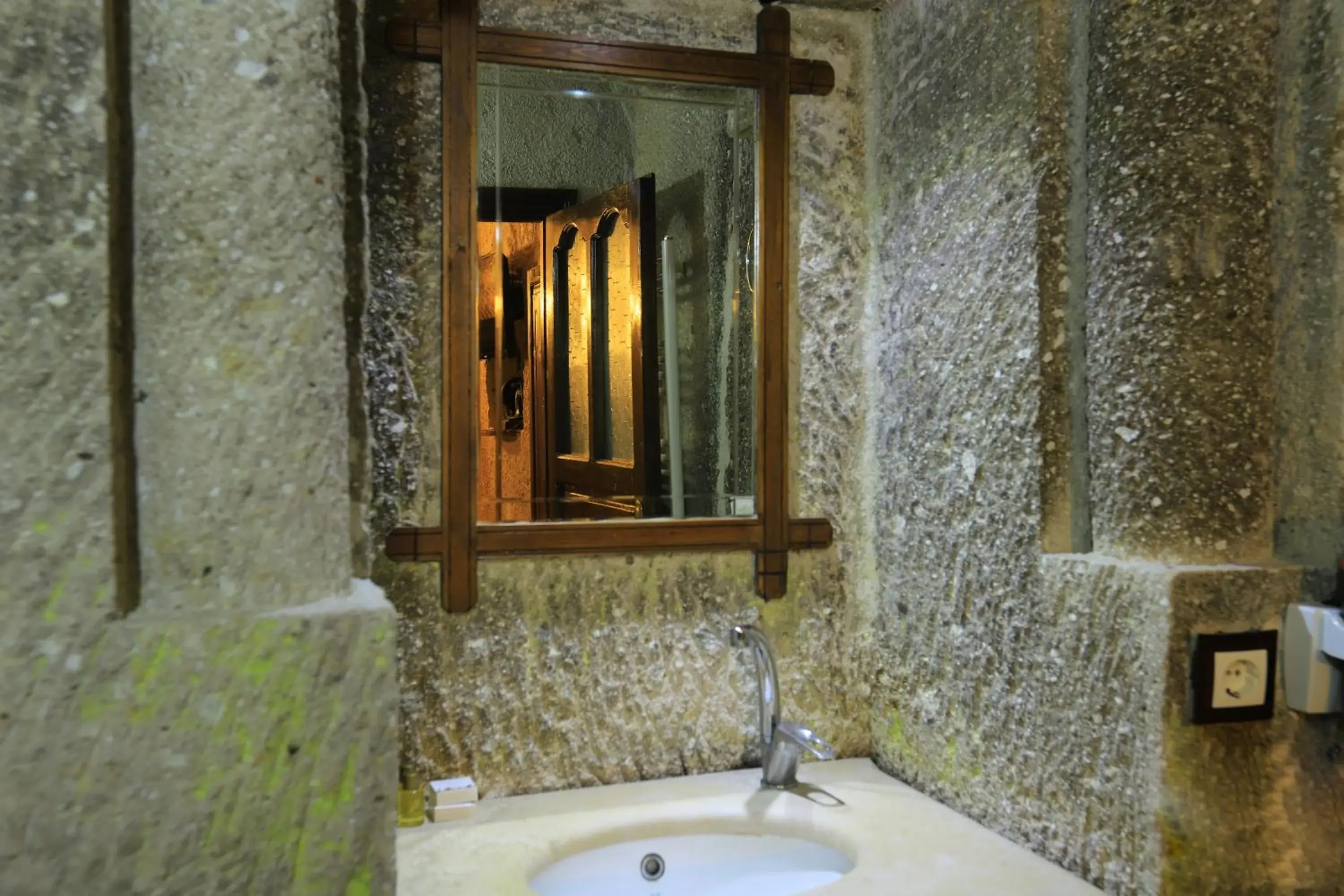 Decorative detail, Bathroom in Antique Terrace Cave Suites