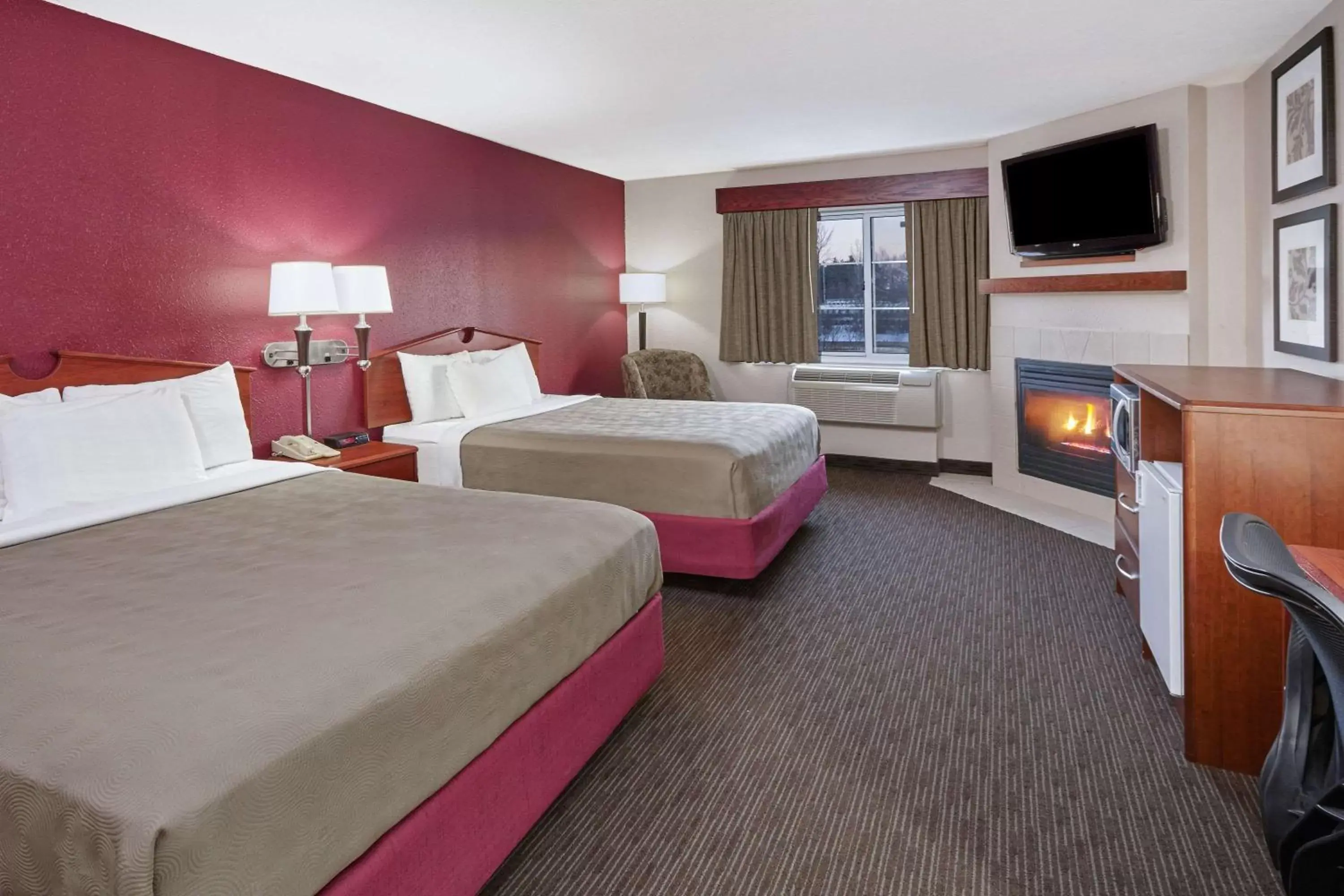 Photo of the whole room, Bed in AmericInn by Wyndham Douglas/Saugatuck