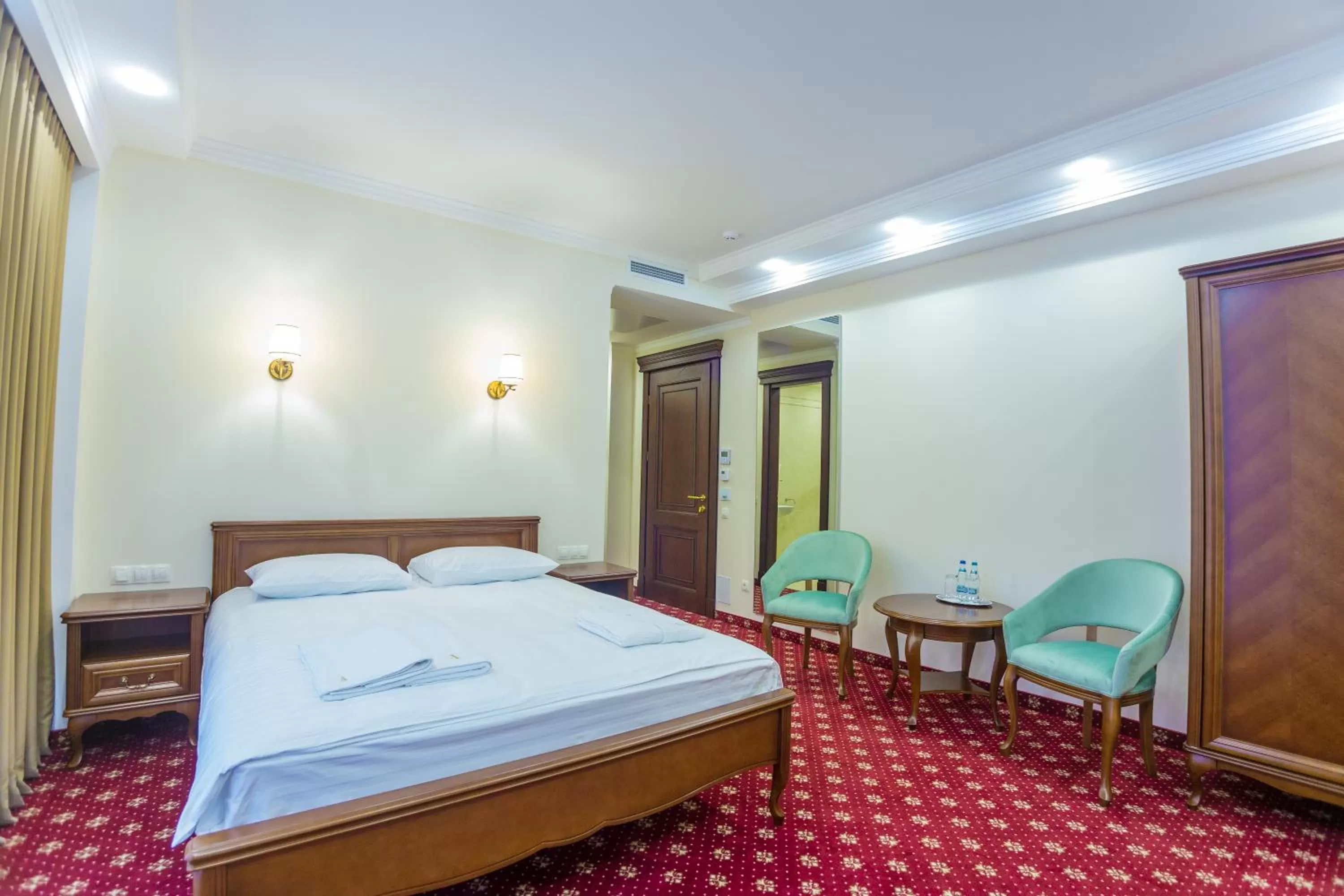 Photo of the whole room, Bed in Ambassador Hotel