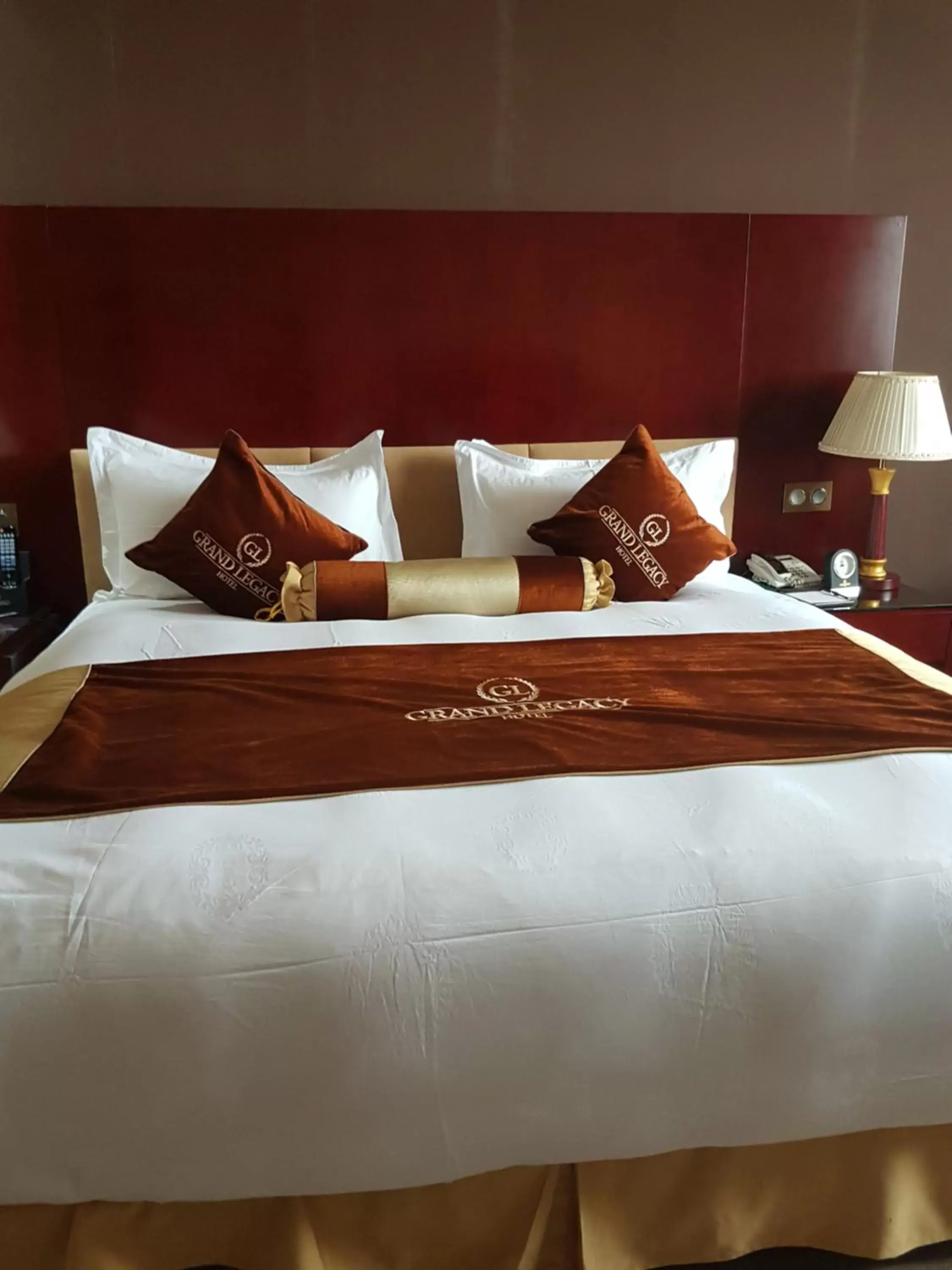 Bed in Grand Legacy Hotel