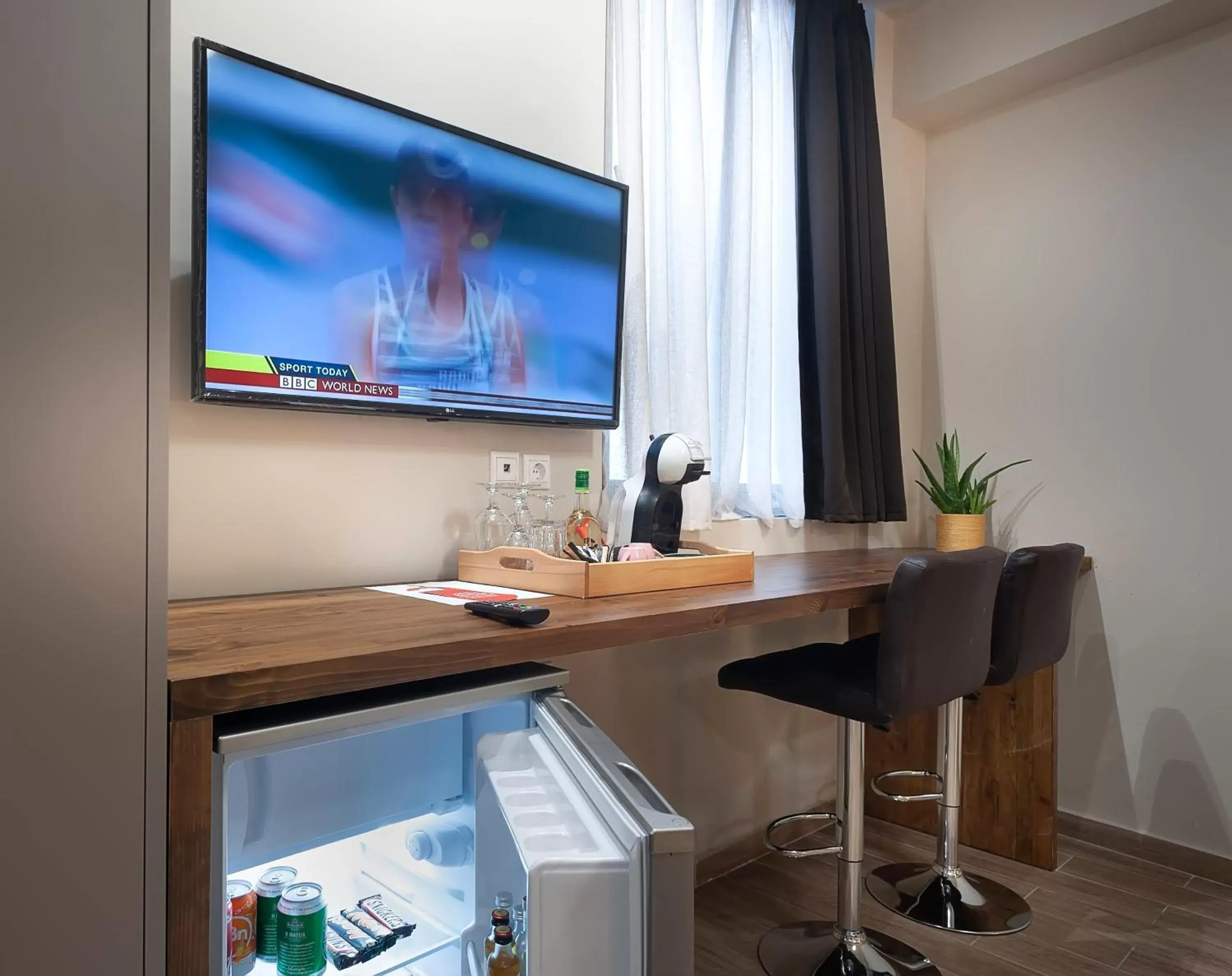 TV and multimedia, TV/Entertainment Center in Pallada Athens boutique rooms & apartments