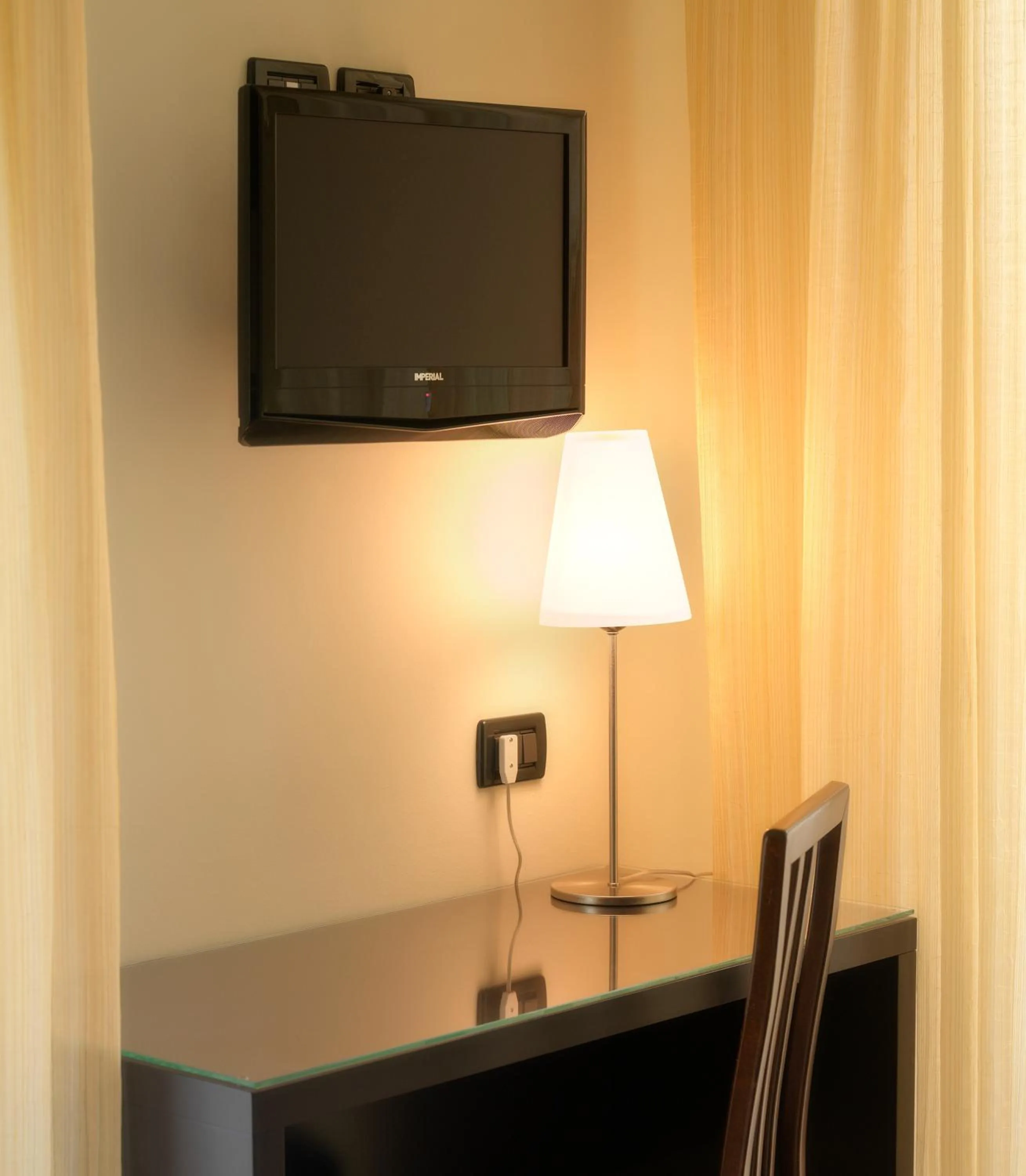 TV and multimedia in ACasaMia WelcHome Hotel