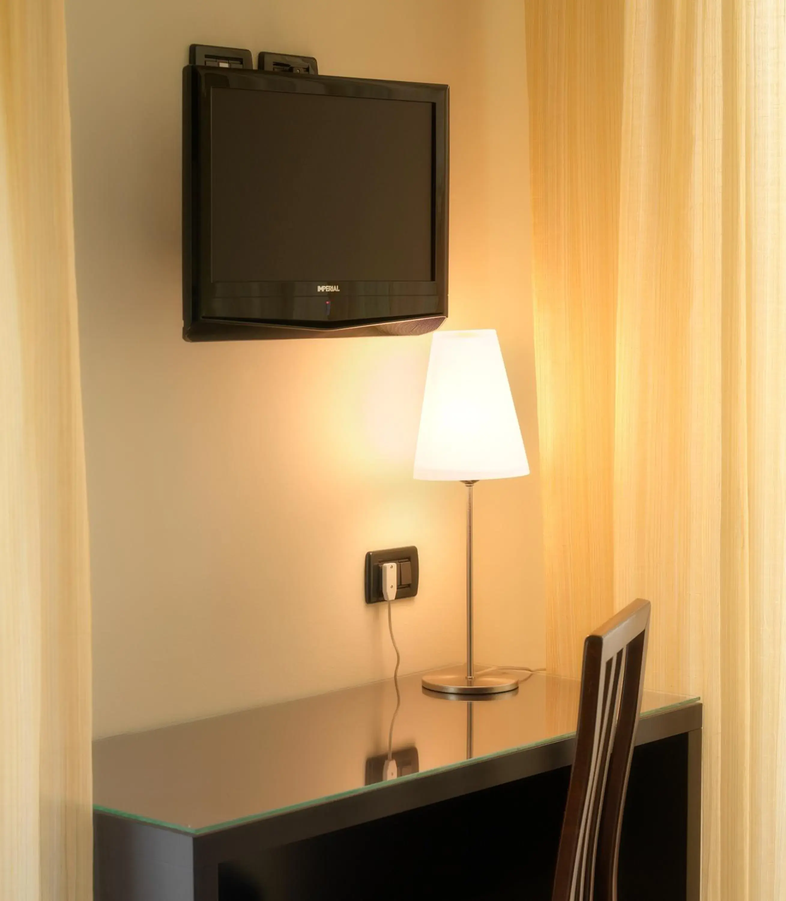 TV and multimedia, TV/Entertainment Center in ACasaMia WelcHome Hotel