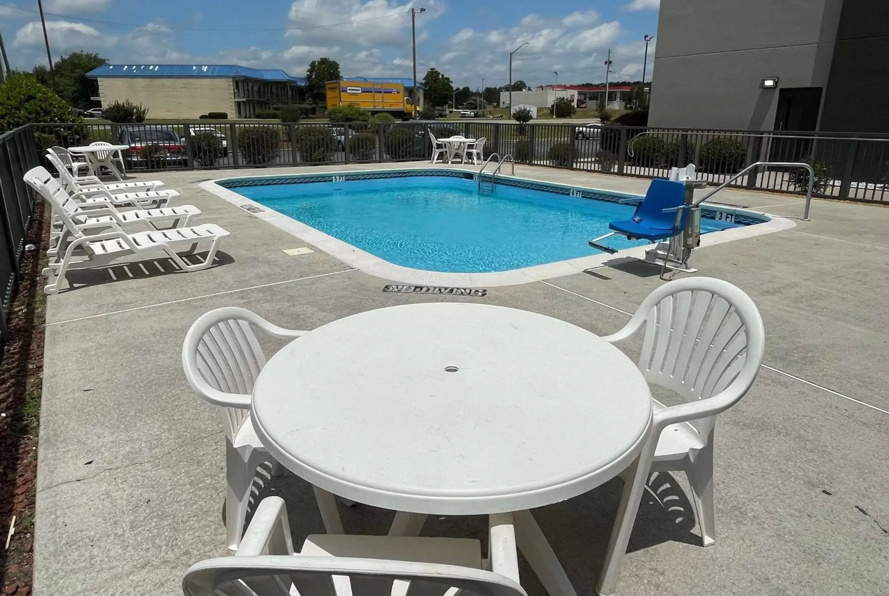 Patio, Swimming Pool in La Quinta Inn & Suites by Wyndham Fayetteville I-95