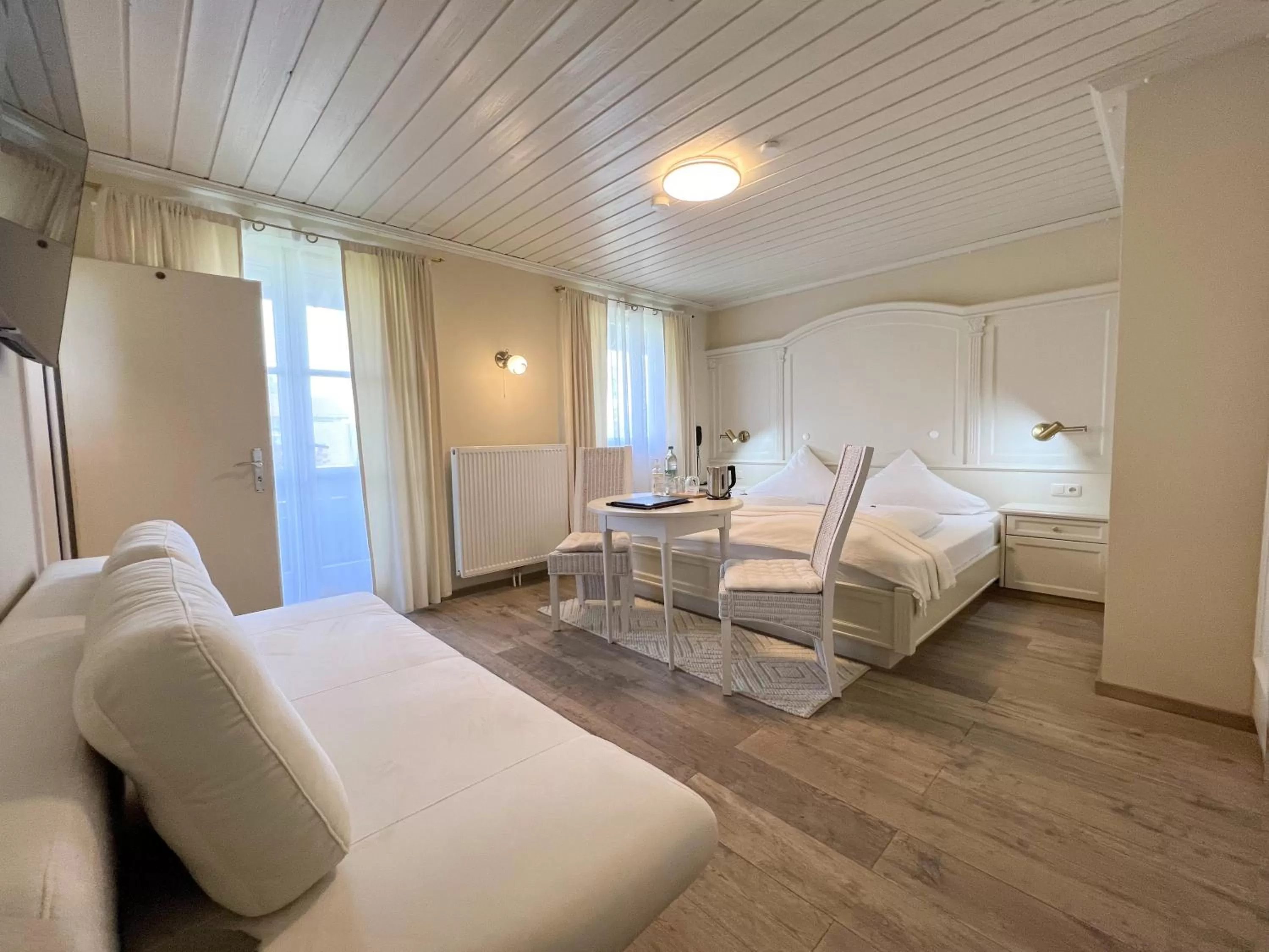 Photo of the whole room, Bed in Hotel Schlossblick Chiemsee