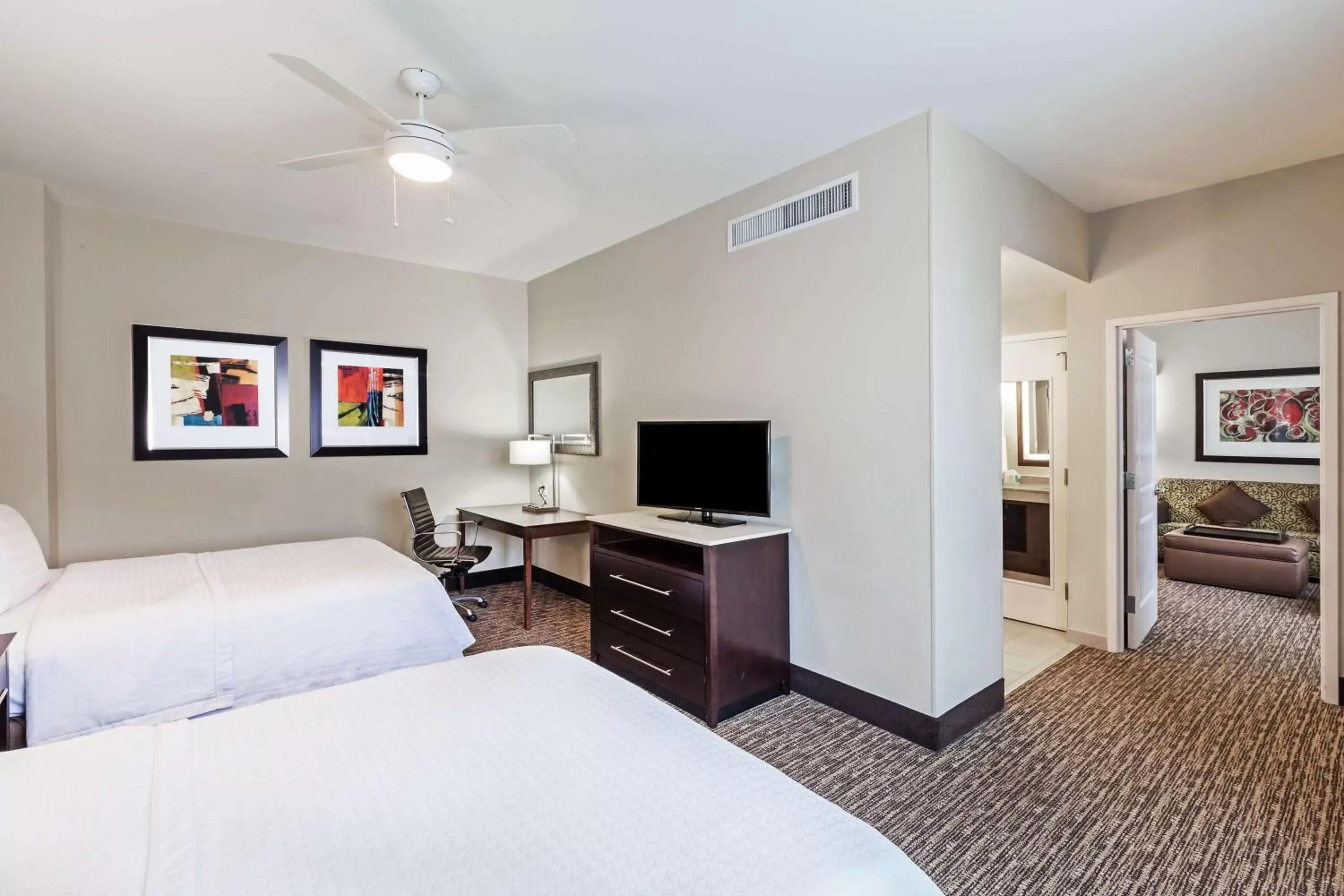 Bedroom, TV/Entertainment Center in Homewood Suites Dallas Downtown