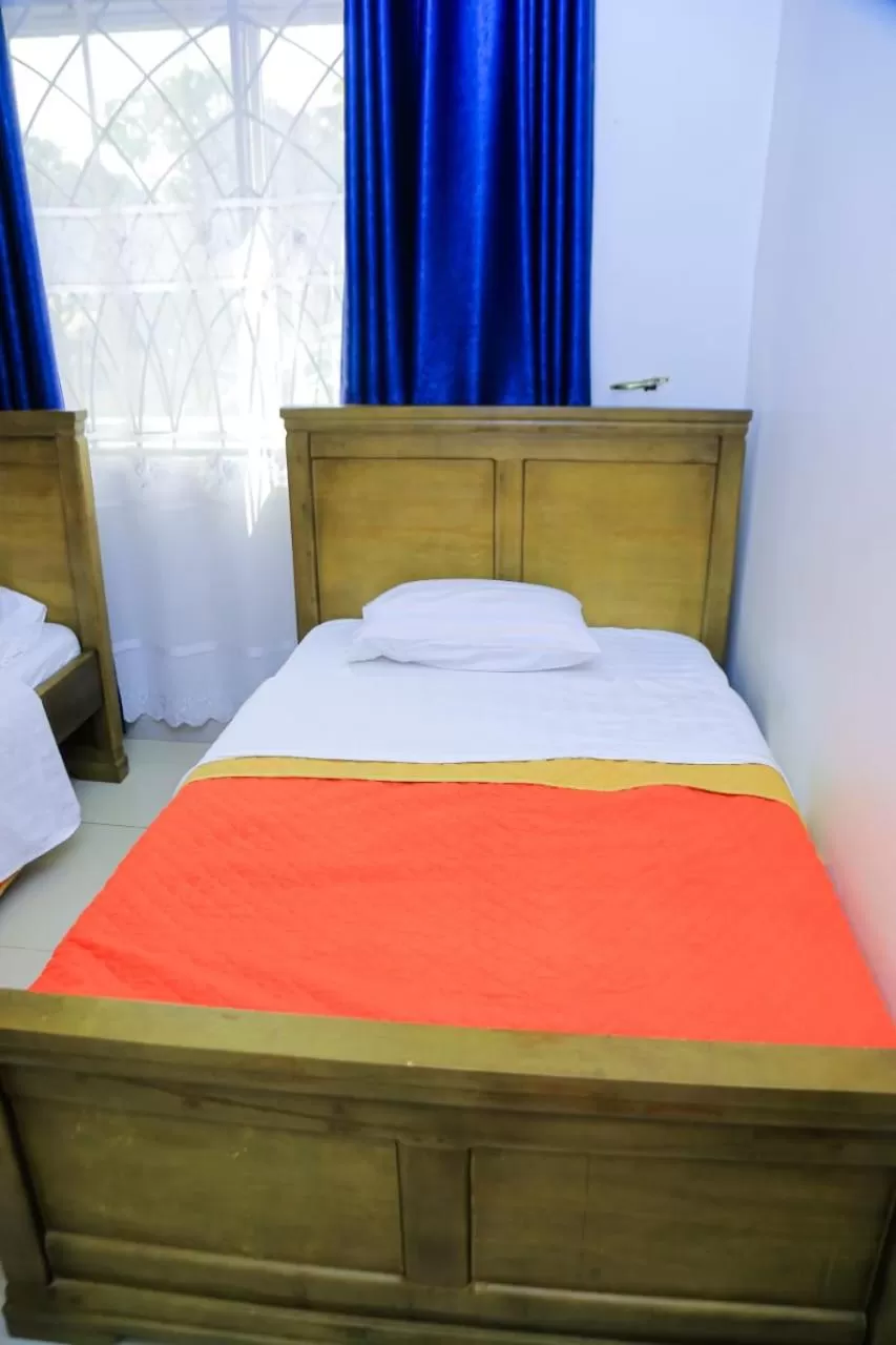 Bed in Karibu Namugongo