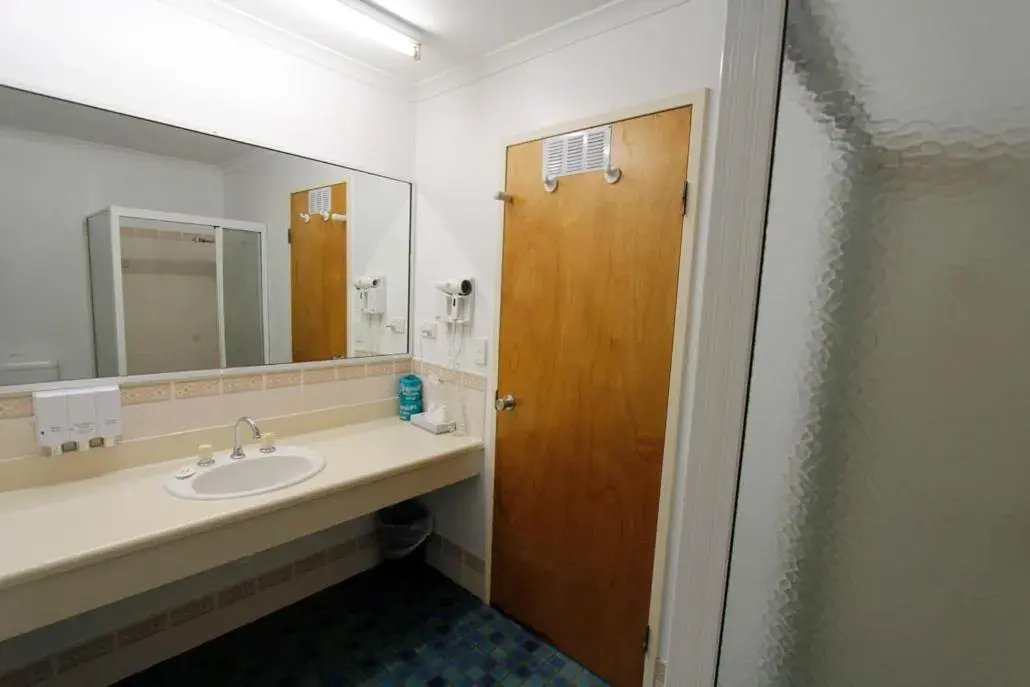 Bathroom in Blue Shades Motel