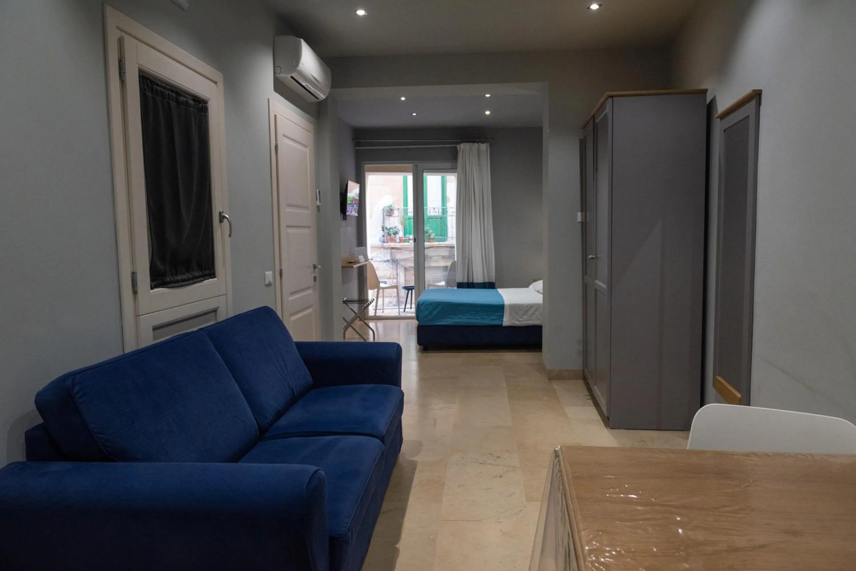 Photo of the whole room, Bed in ZIBIBBO SUITES & ROOMS - Aparthotel in Centro Storico a Trapani