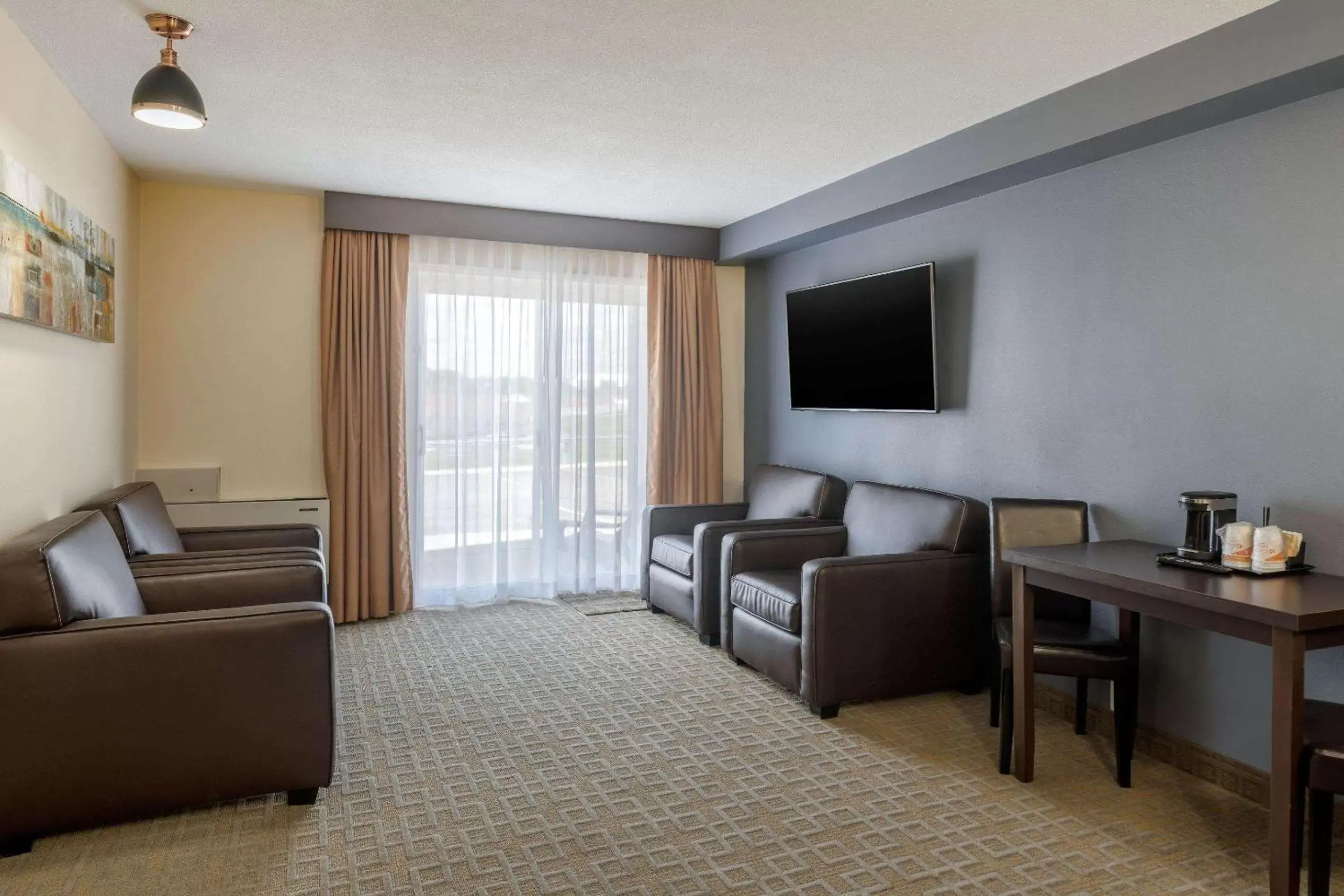 Photo of the whole room, Seating Area in Quality Inn & Suites