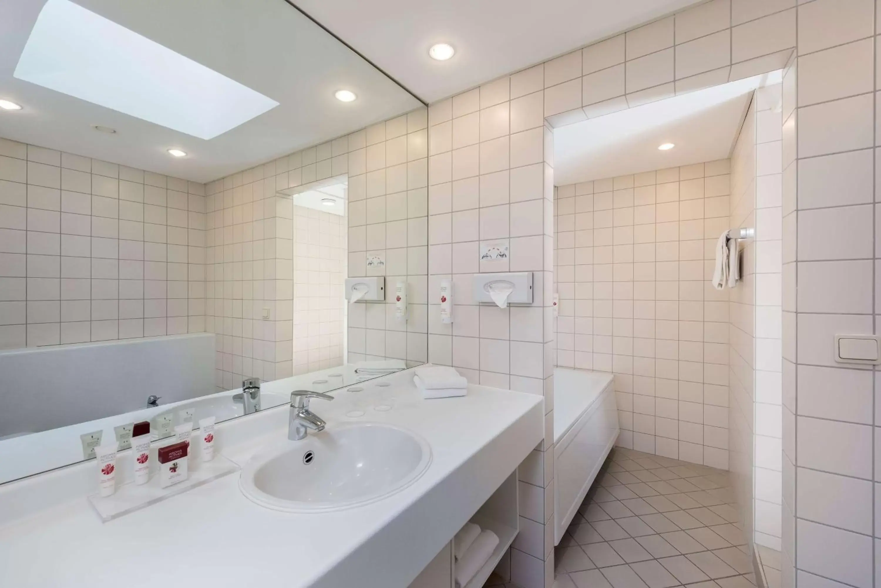 Bathroom in Ramada by Wyndham Flensburg