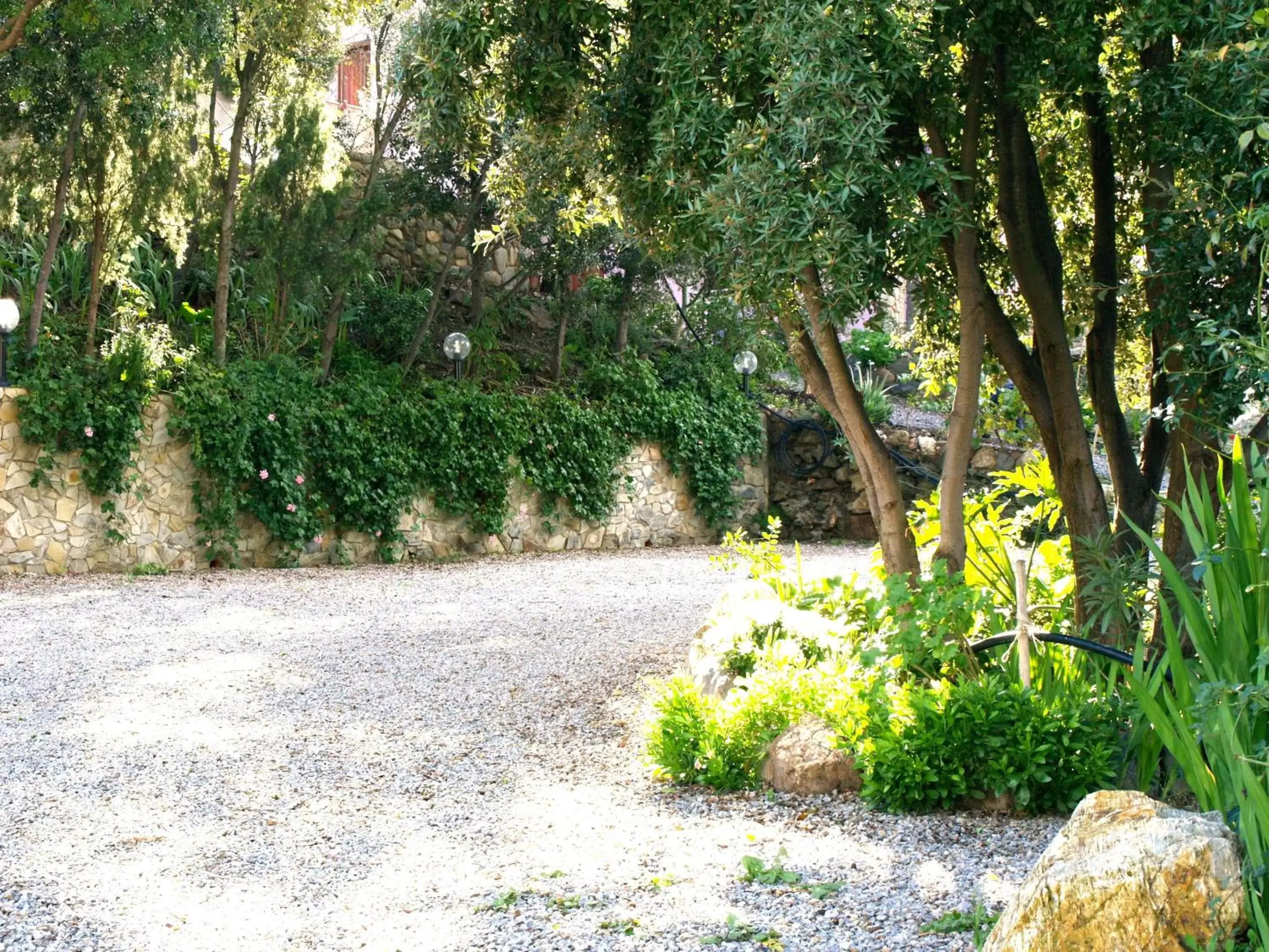 Garden in Residenza Locci - Rooms & Apartments