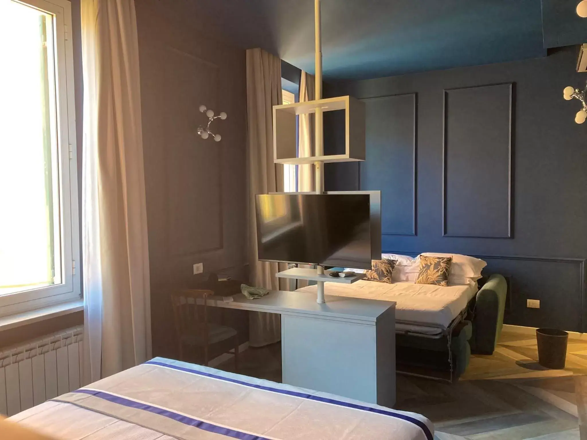 Bed, TV/Entertainment Center in Hotel Monte Rosa